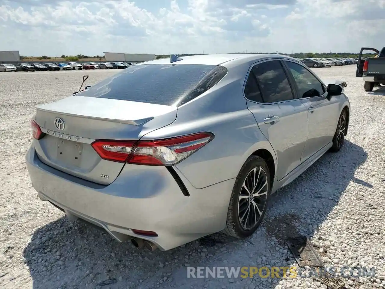 4 Photograph of a damaged car 4T1B11HK0KU687067 TOYOTA CAMRY 2019