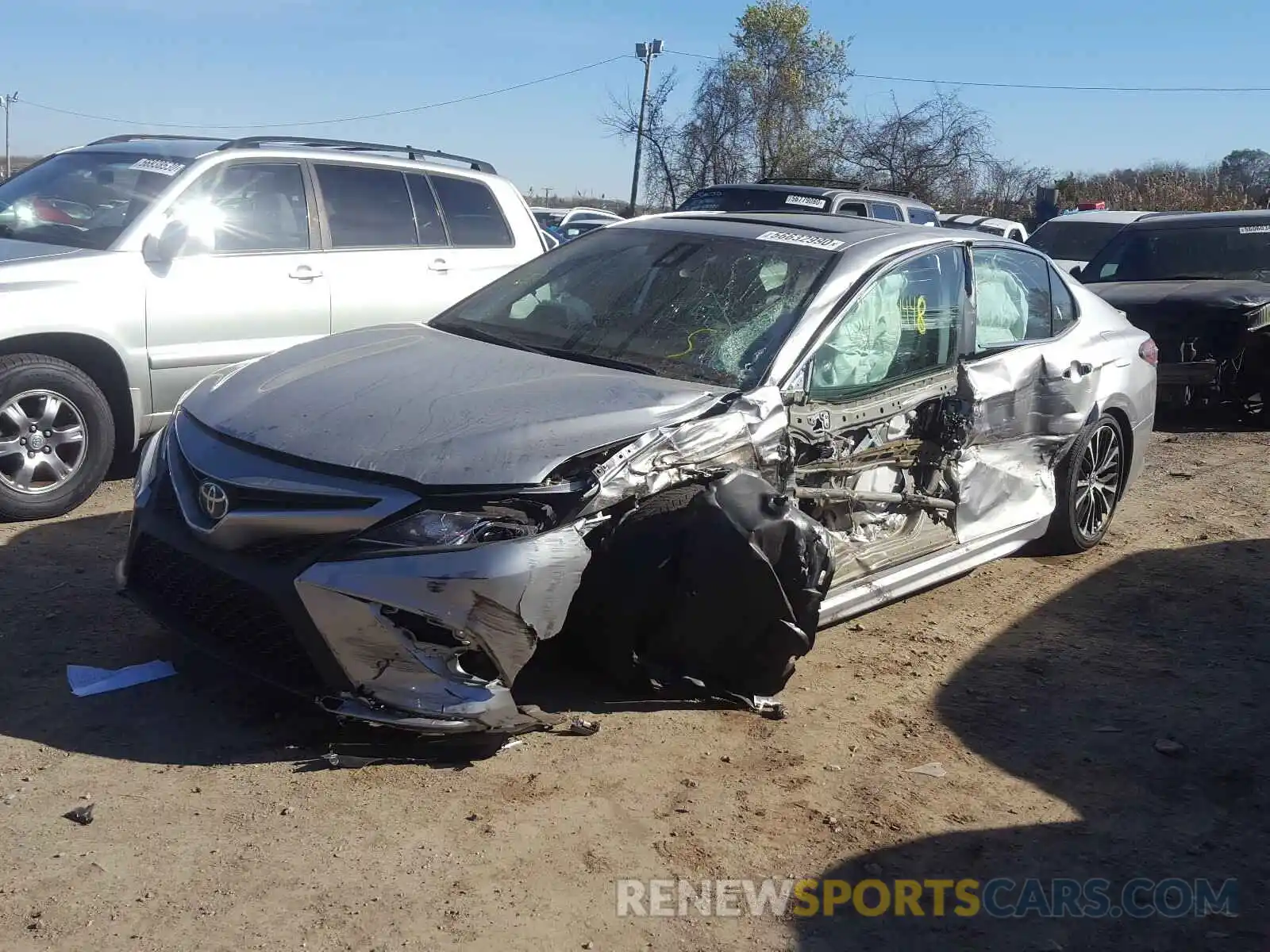 2 Photograph of a damaged car 4T1B11HK0KU687151 TOYOTA CAMRY 2019