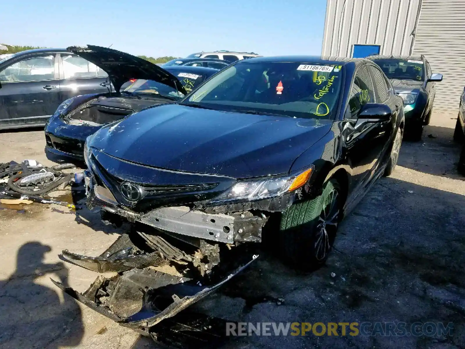 2 Photograph of a damaged car 4T1B11HK0KU687408 TOYOTA CAMRY 2019