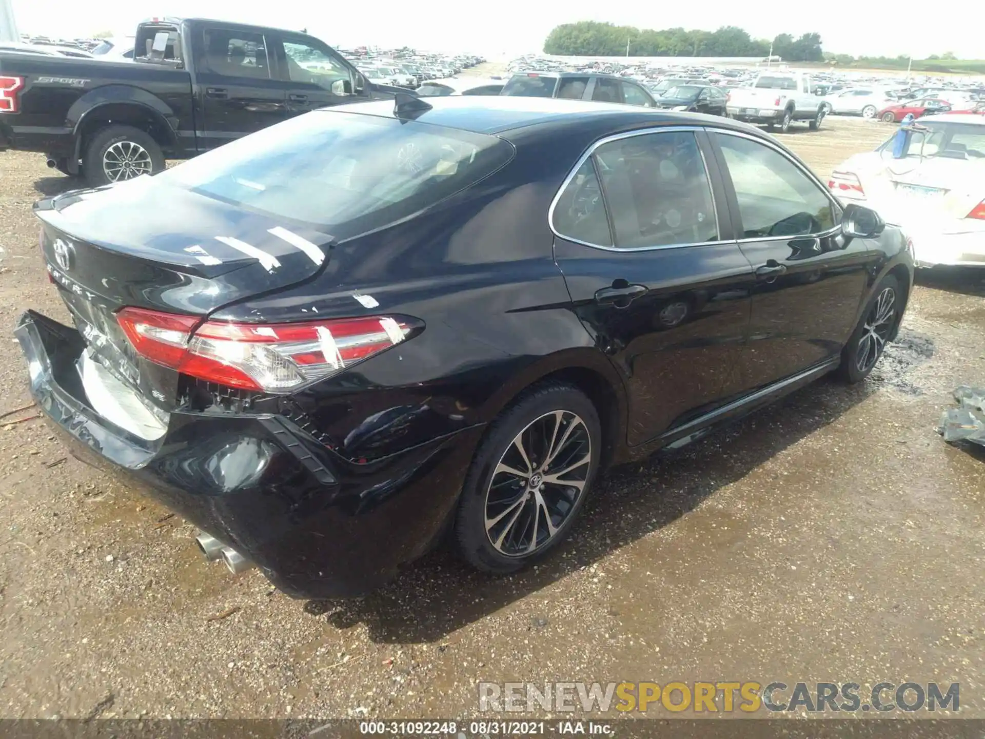 4 Photograph of a damaged car 4T1B11HK0KU687635 TOYOTA CAMRY 2019