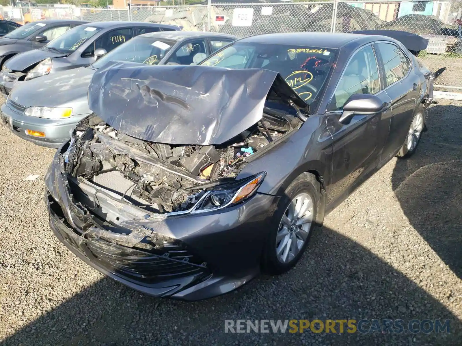 2 Photograph of a damaged car 4T1B11HK0KU689997 TOYOTA CAMRY 2019