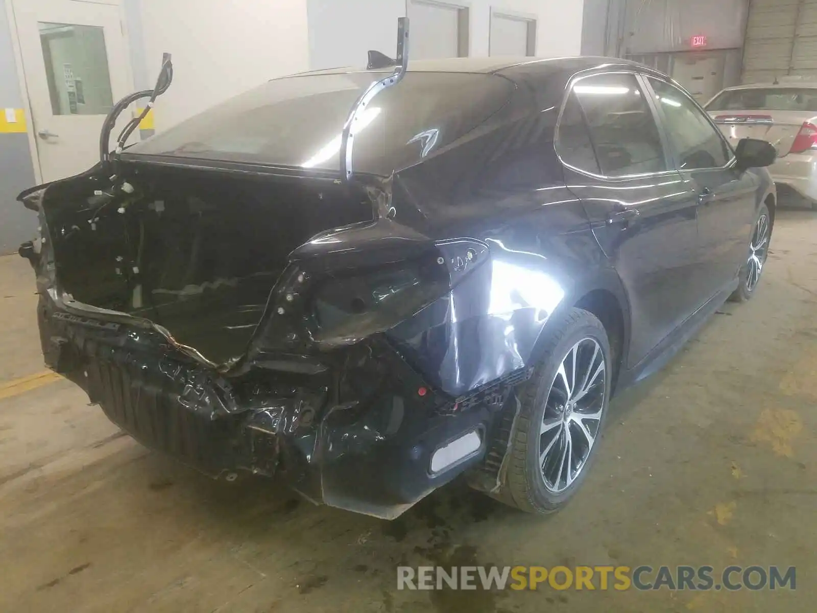 4 Photograph of a damaged car 4T1B11HK0KU690387 TOYOTA CAMRY 2019