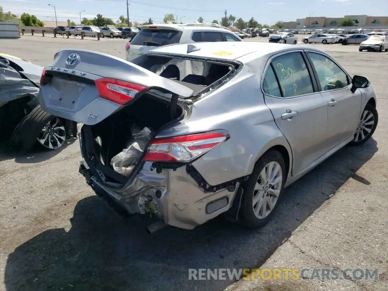 4 Photograph of a damaged car 4T1B11HK0KU691314 TOYOTA CAMRY 2019