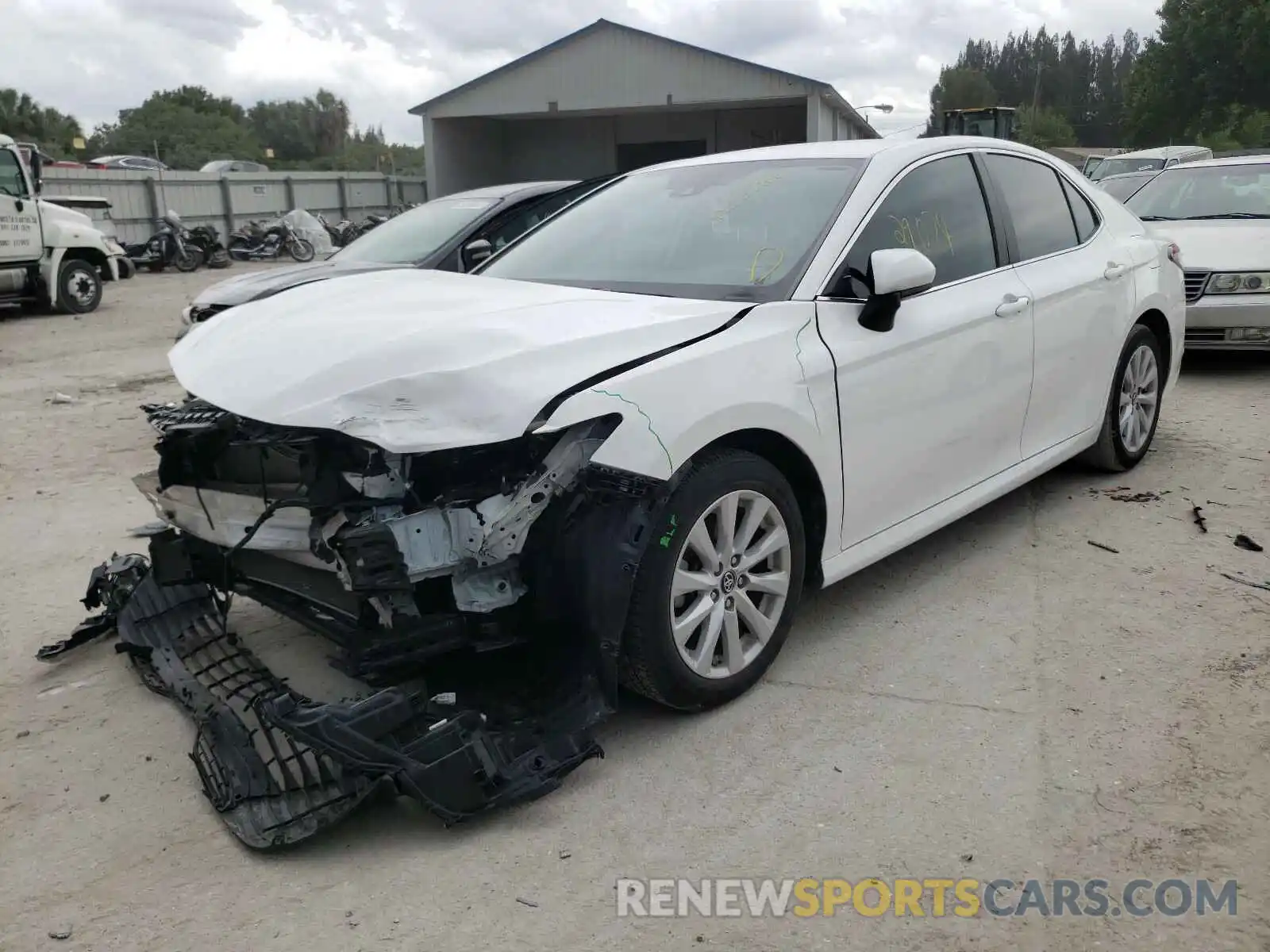 2 Photograph of a damaged car 4T1B11HK0KU691426 TOYOTA CAMRY 2019