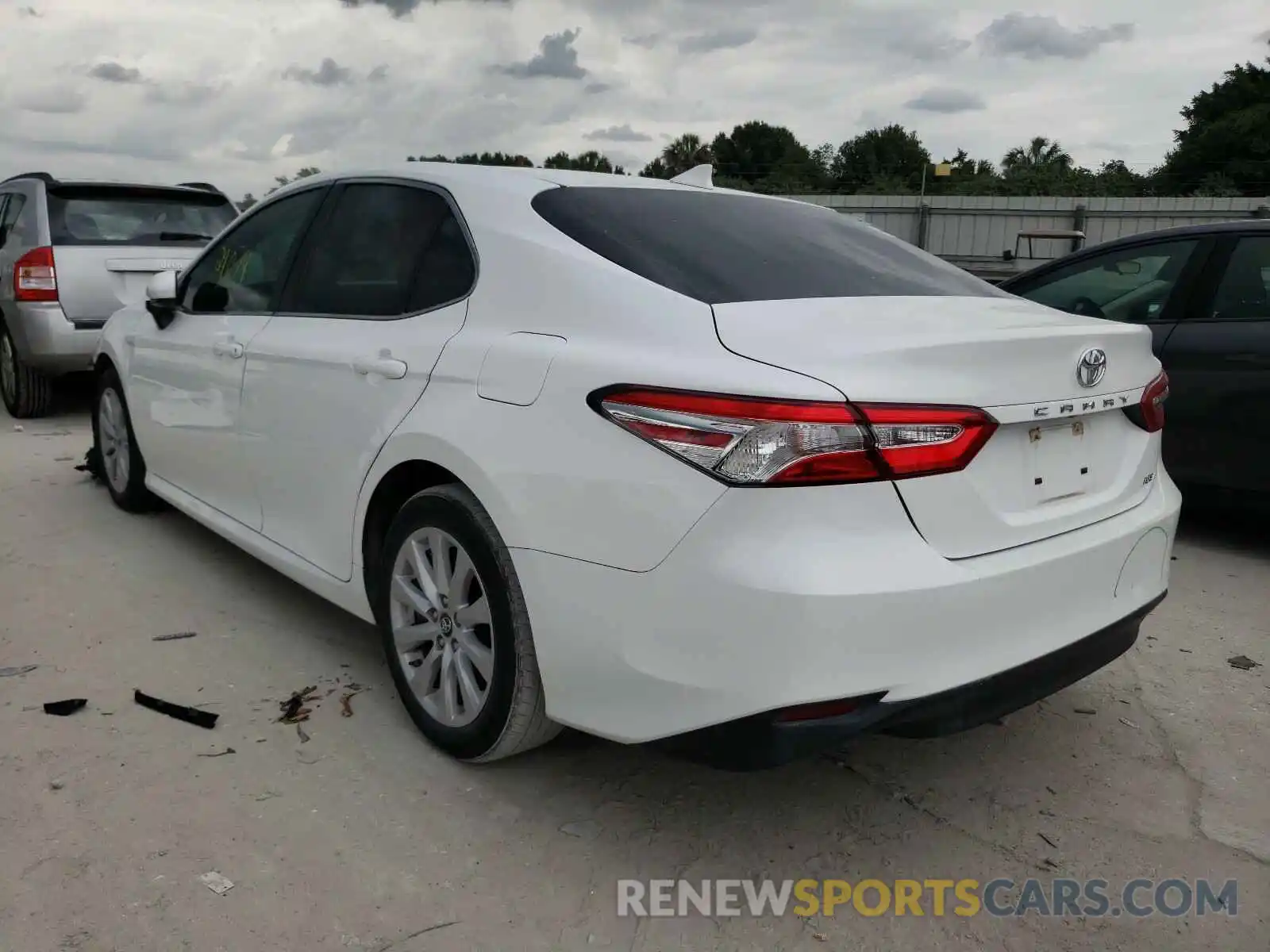 3 Photograph of a damaged car 4T1B11HK0KU691426 TOYOTA CAMRY 2019