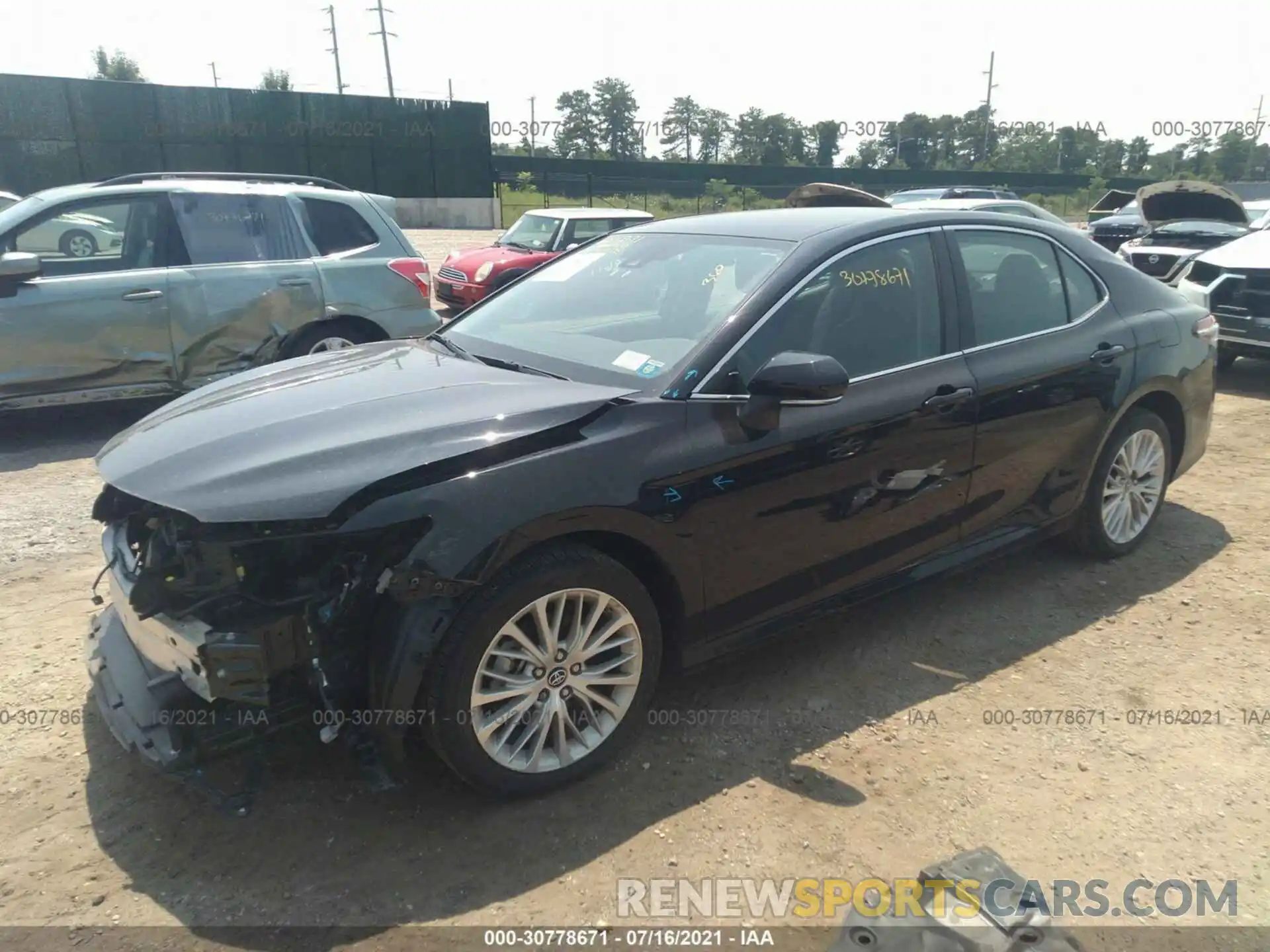 2 Photograph of a damaged car 4T1B11HK0KU693046 TOYOTA CAMRY 2019