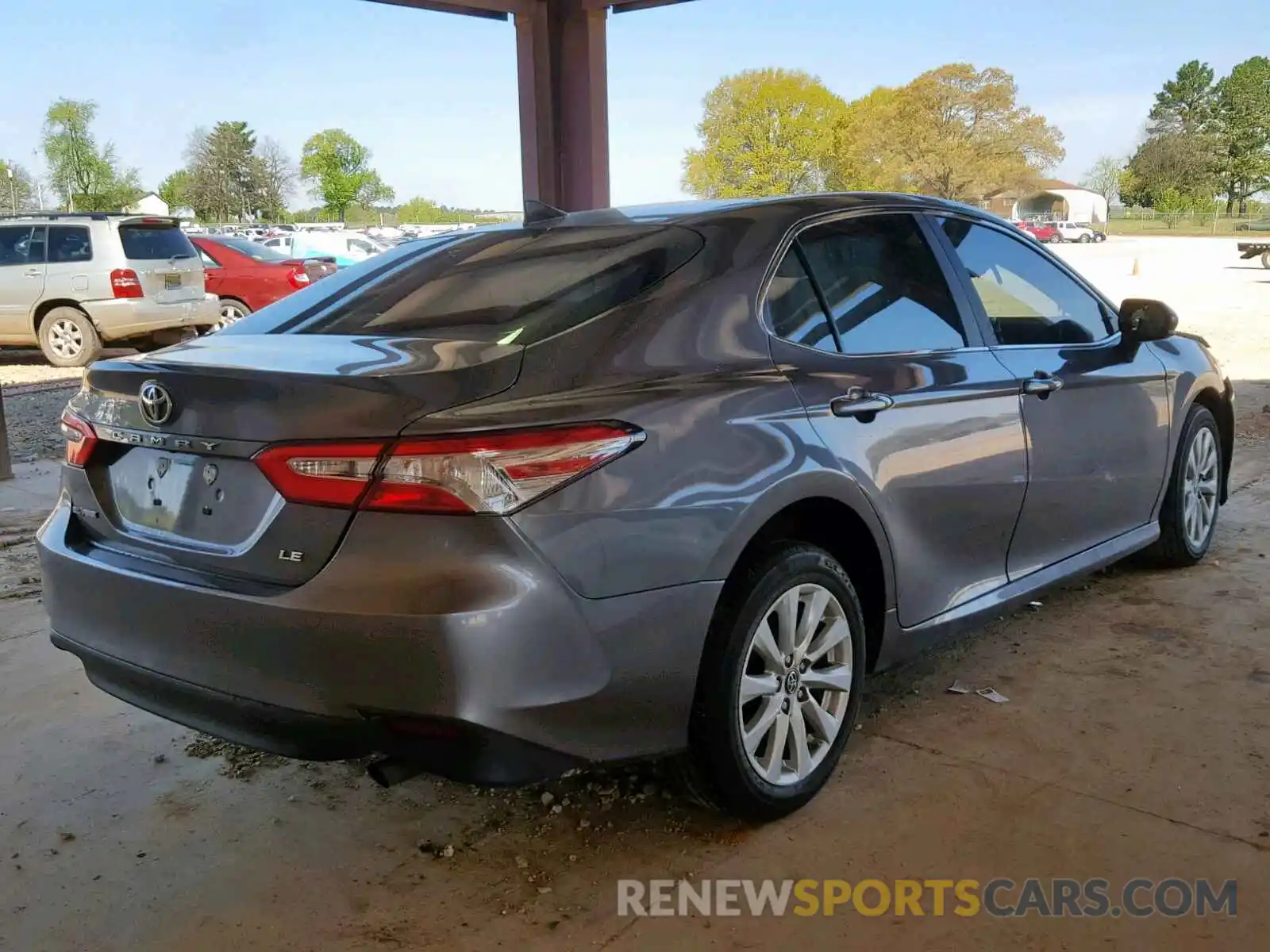 4 Photograph of a damaged car 4T1B11HK0KU693872 TOYOTA CAMRY 2019