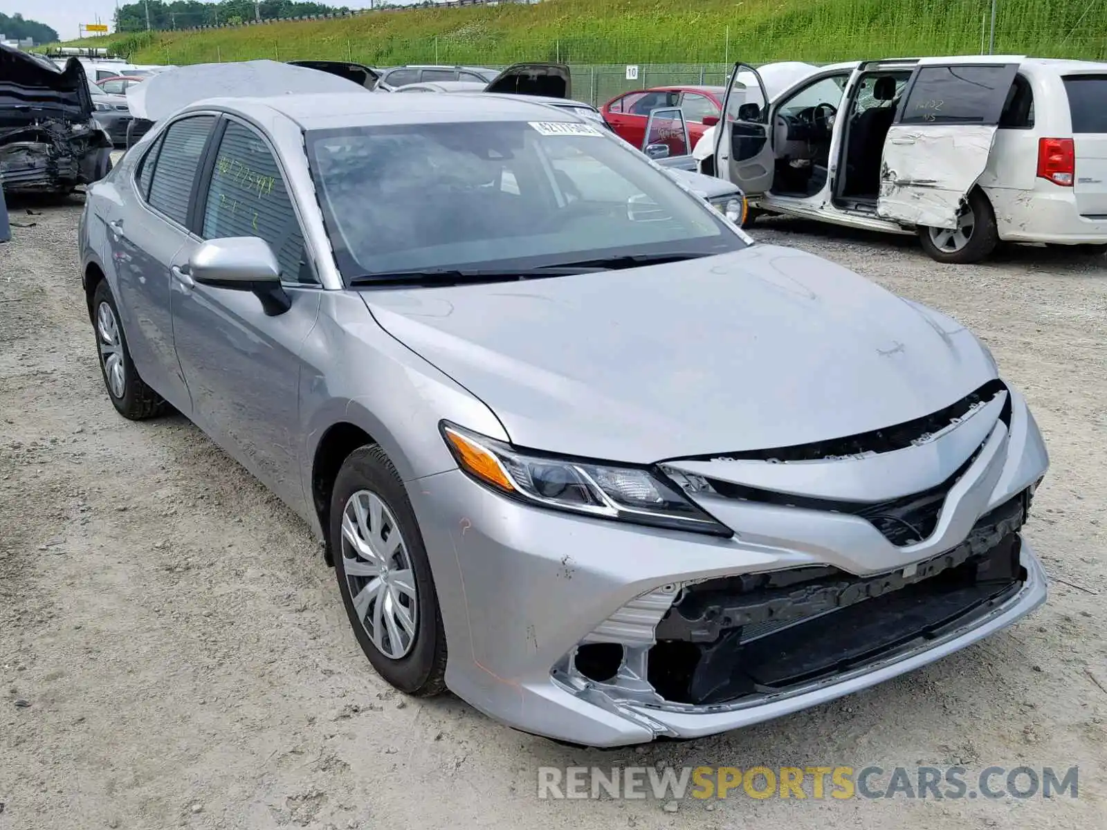 1 Photograph of a damaged car 4T1B11HK0KU694861 TOYOTA CAMRY 2019