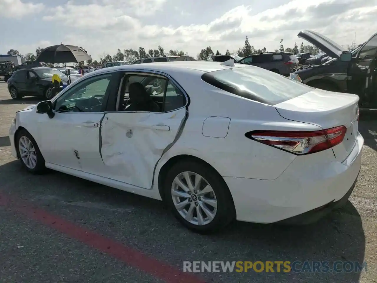 2 Photograph of a damaged car 4T1B11HK0KU695931 TOYOTA CAMRY 2019