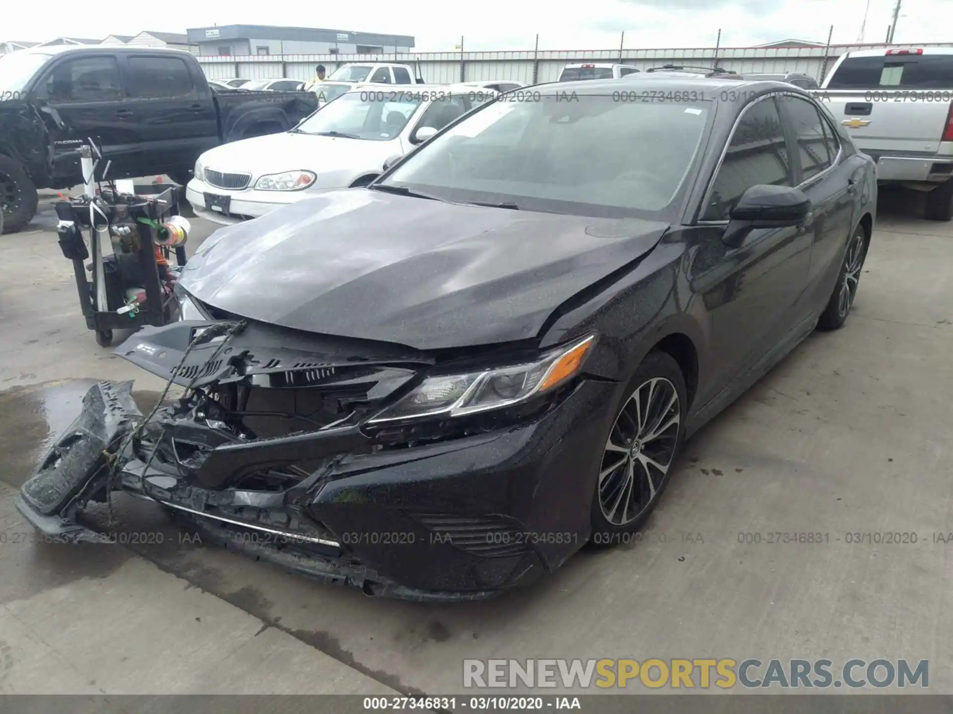 2 Photograph of a damaged car 4T1B11HK0KU696044 TOYOTA CAMRY 2019