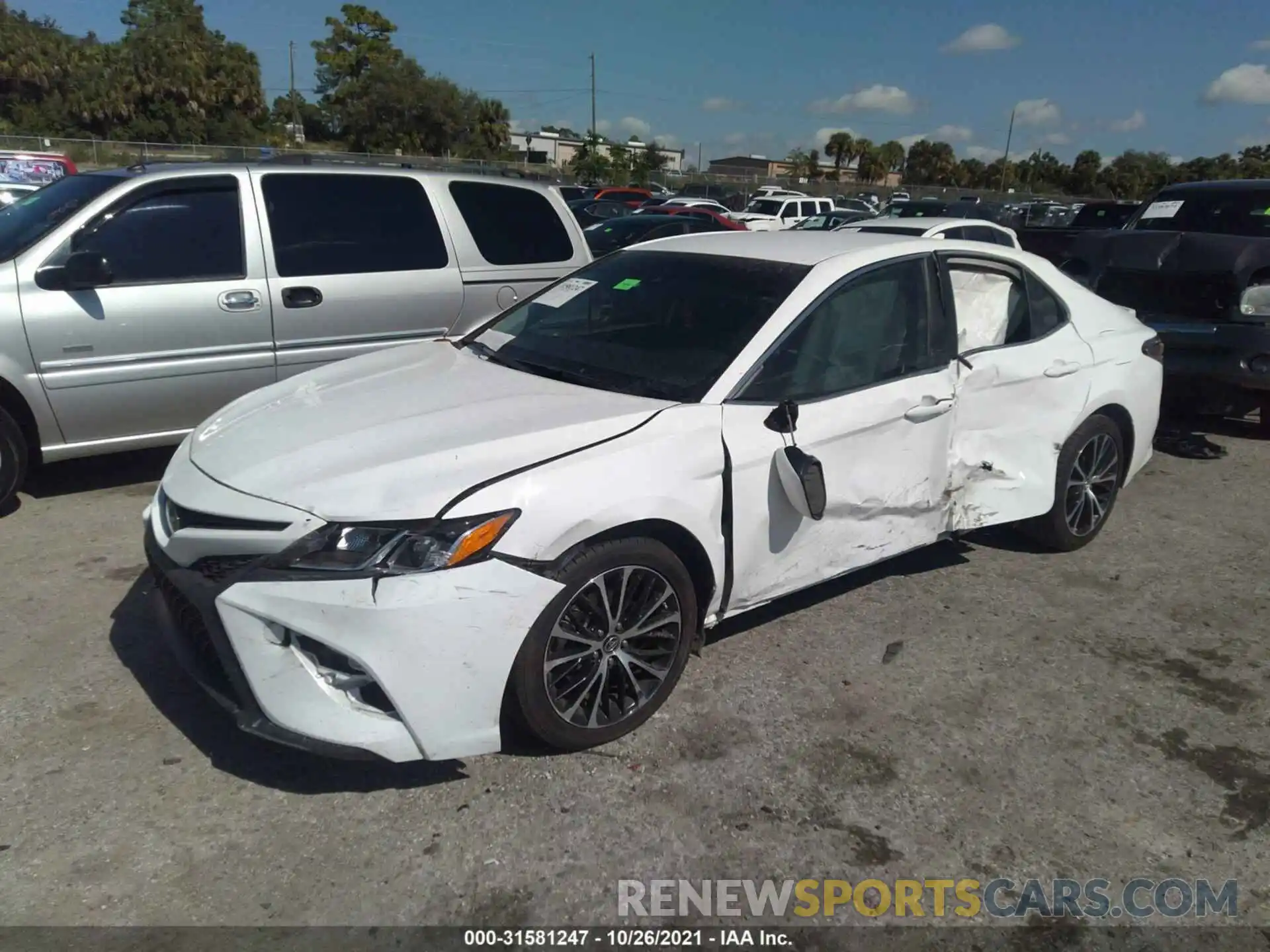 2 Photograph of a damaged car 4T1B11HK0KU697582 TOYOTA CAMRY 2019