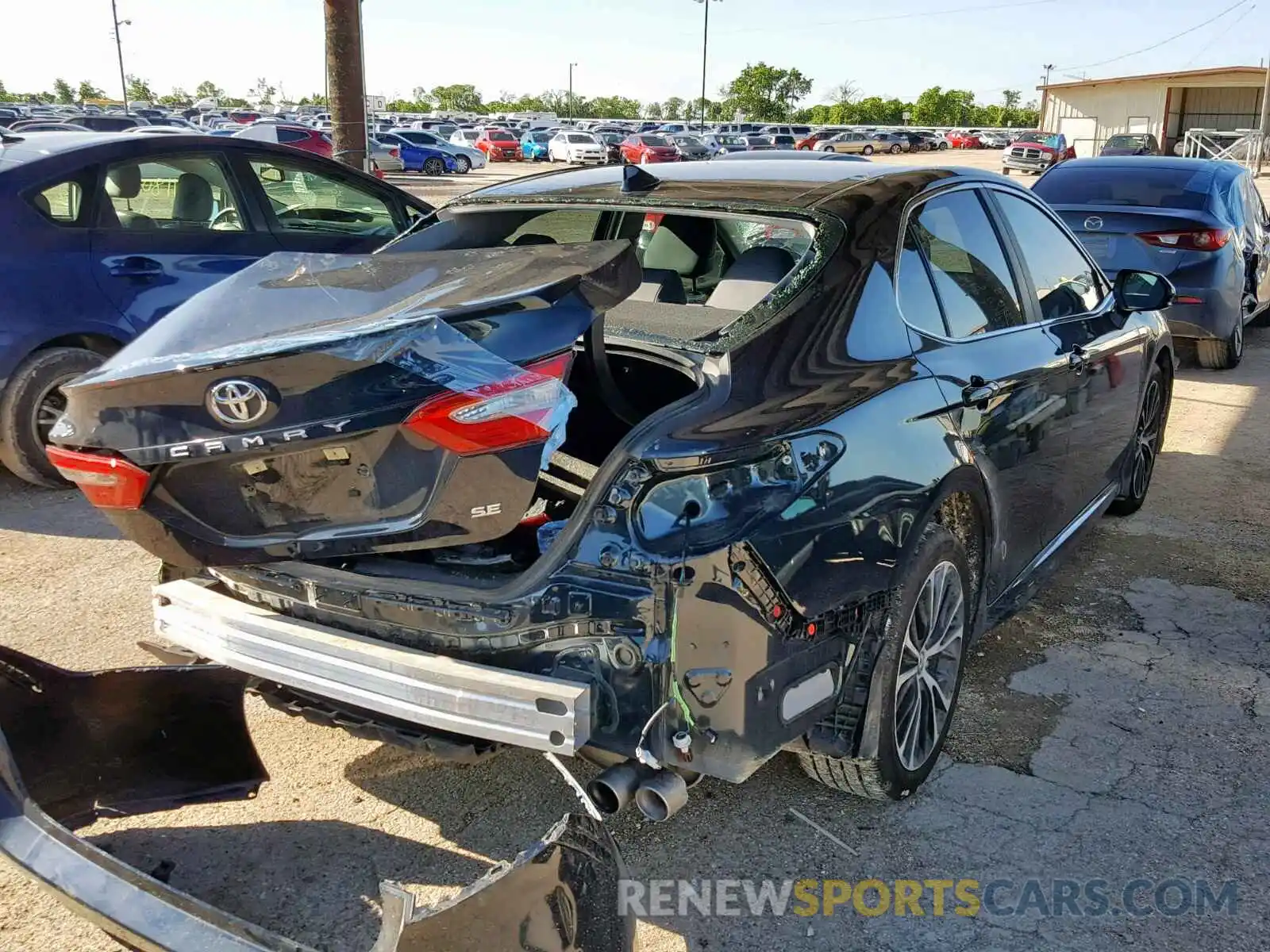 4 Photograph of a damaged car 4T1B11HK0KU697839 TOYOTA CAMRY 2019