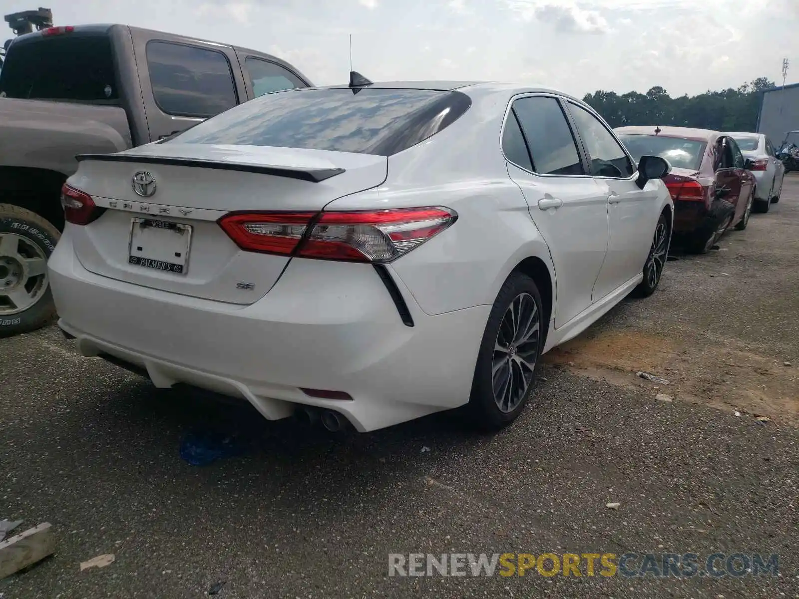 4 Photograph of a damaged car 4T1B11HK0KU698621 TOYOTA CAMRY 2019