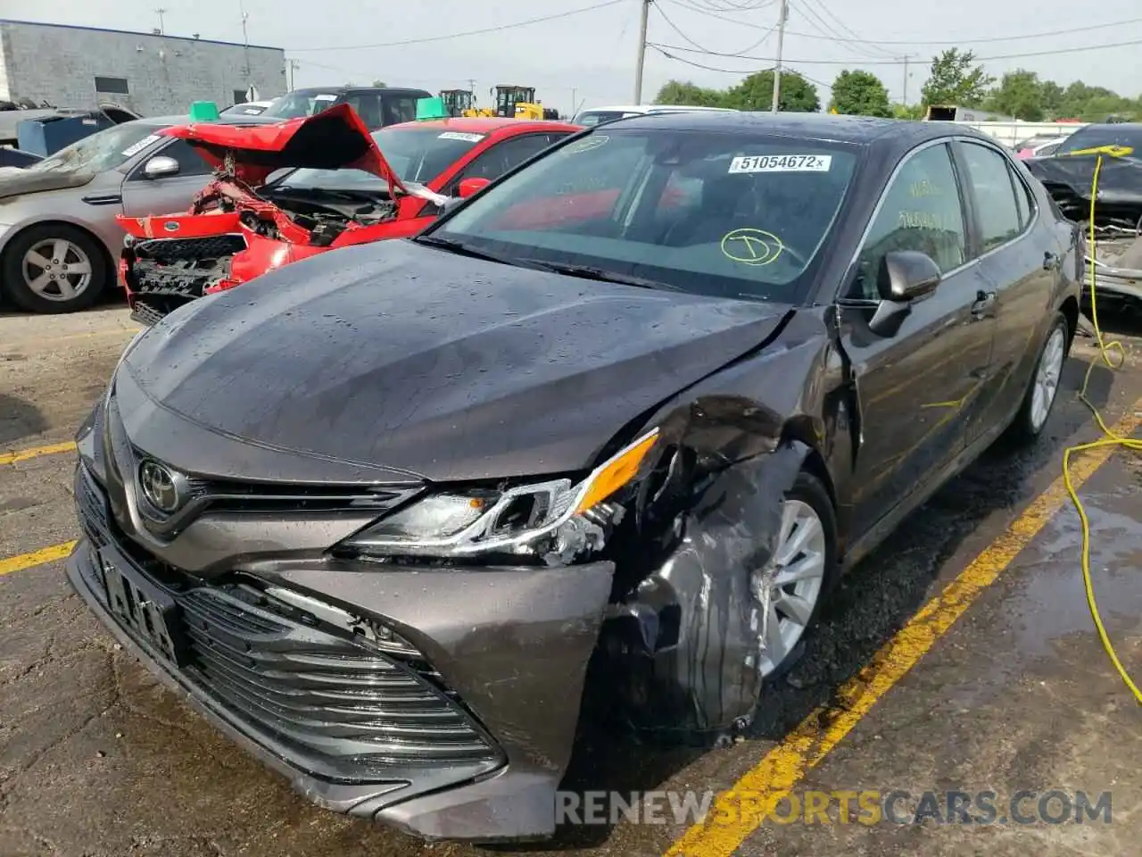 2 Photograph of a damaged car 4T1B11HK0KU699459 TOYOTA CAMRY 2019