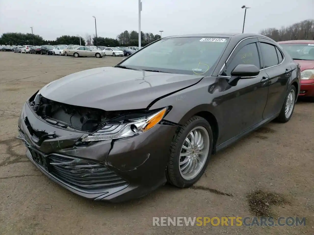 2 Photograph of a damaged car 4T1B11HK0KU699915 TOYOTA CAMRY 2019