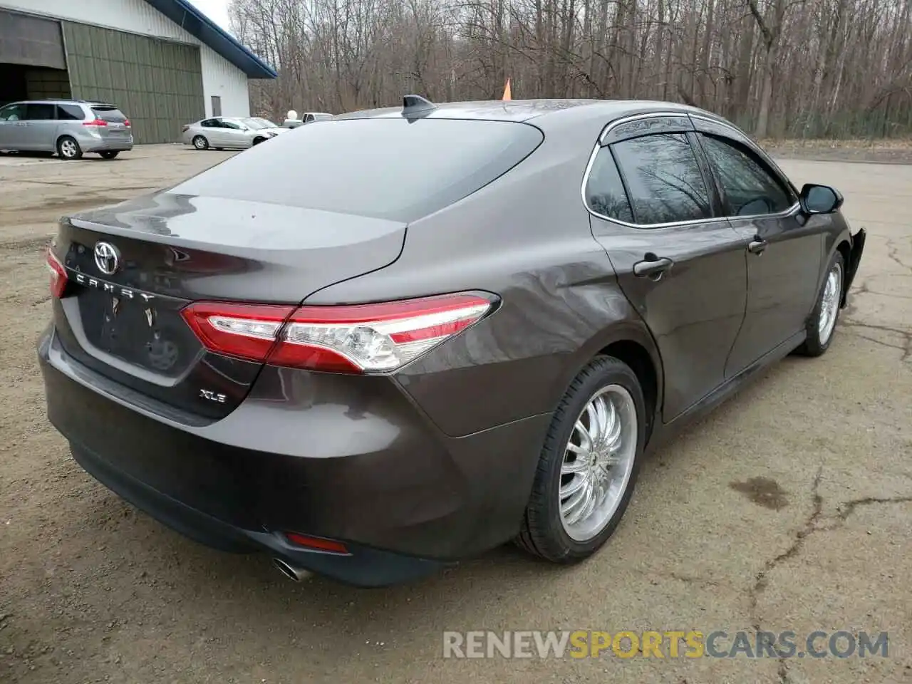 4 Photograph of a damaged car 4T1B11HK0KU699915 TOYOTA CAMRY 2019