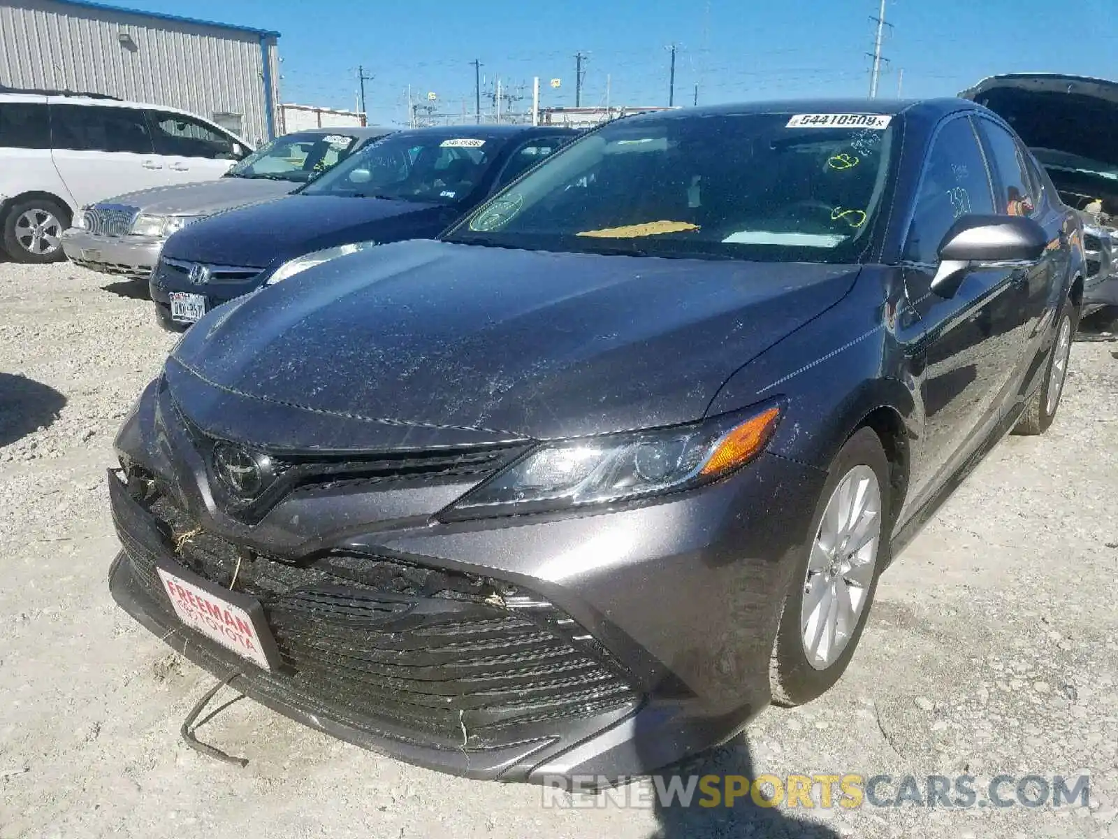 2 Photograph of a damaged car 4T1B11HK0KU700254 TOYOTA CAMRY 2019