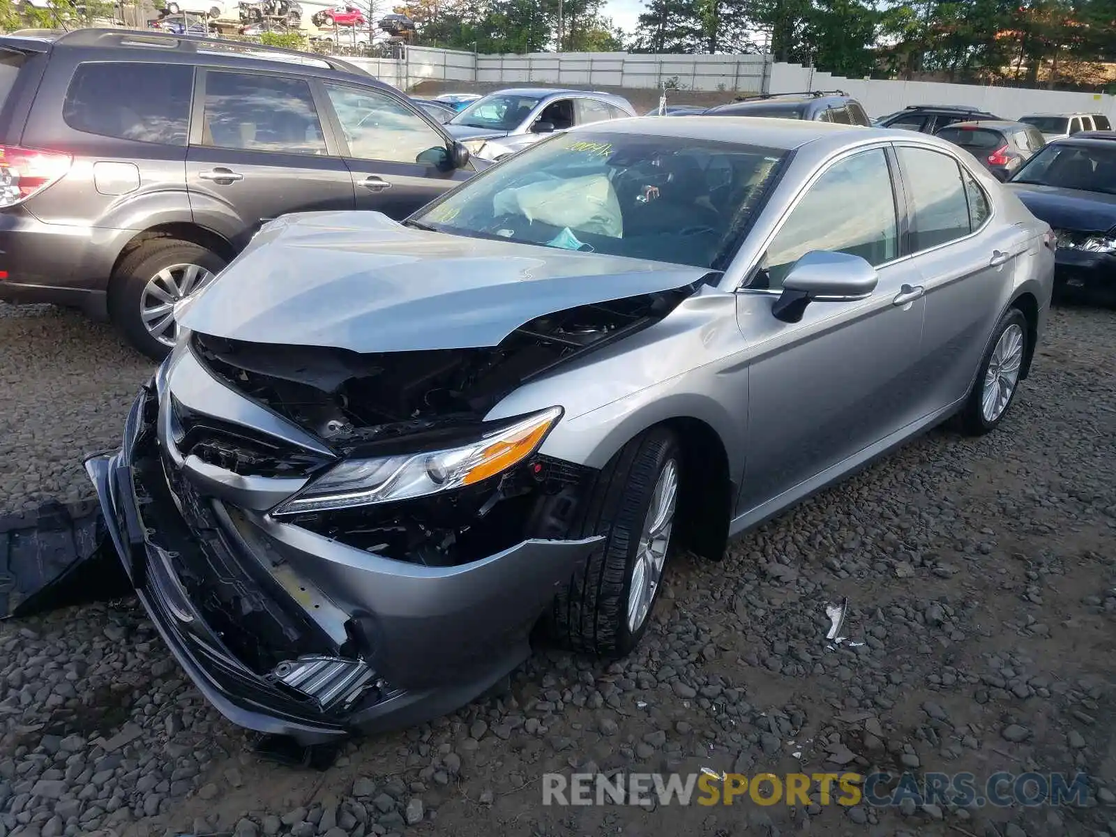 2 Photograph of a damaged car 4T1B11HK0KU700318 TOYOTA CAMRY 2019