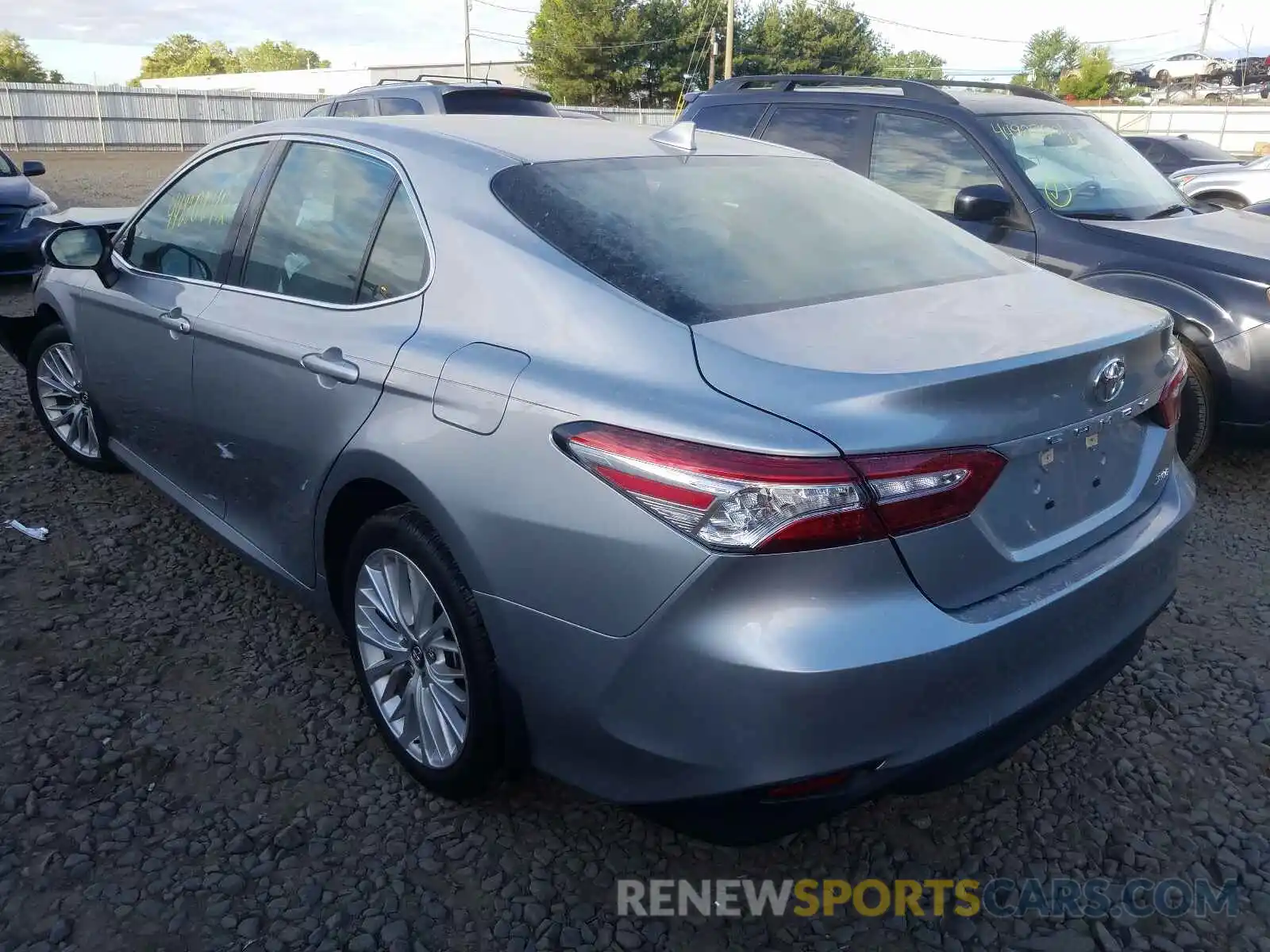 3 Photograph of a damaged car 4T1B11HK0KU700318 TOYOTA CAMRY 2019