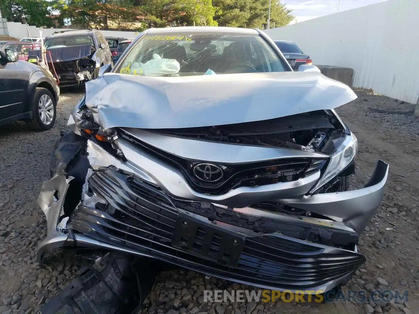 9 Photograph of a damaged car 4T1B11HK0KU700318 TOYOTA CAMRY 2019