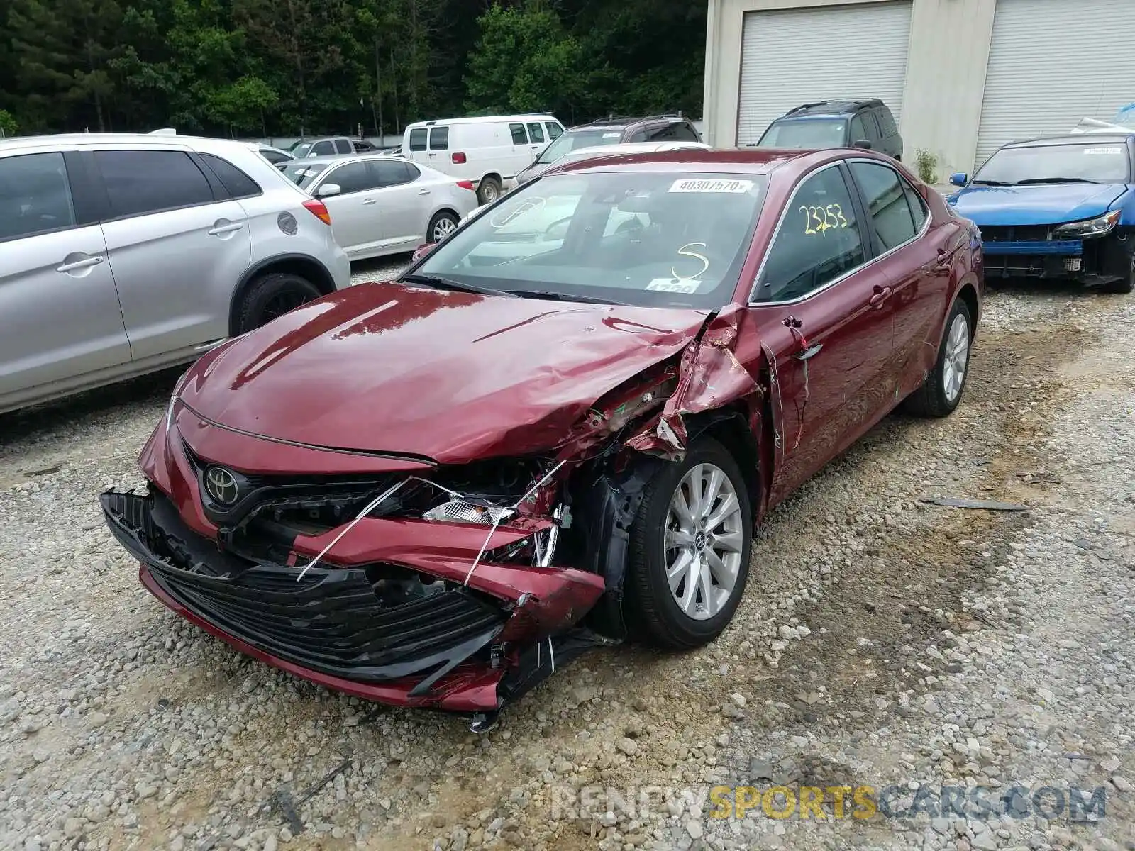 2 Photograph of a damaged car 4T1B11HK0KU701095 TOYOTA CAMRY 2019