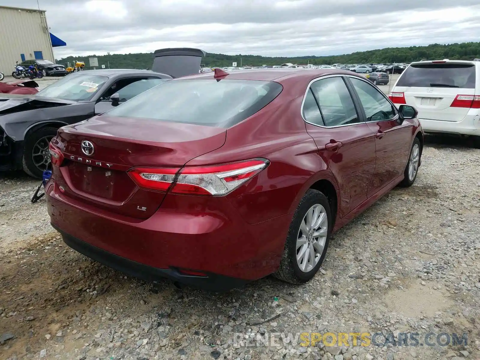 4 Photograph of a damaged car 4T1B11HK0KU701095 TOYOTA CAMRY 2019