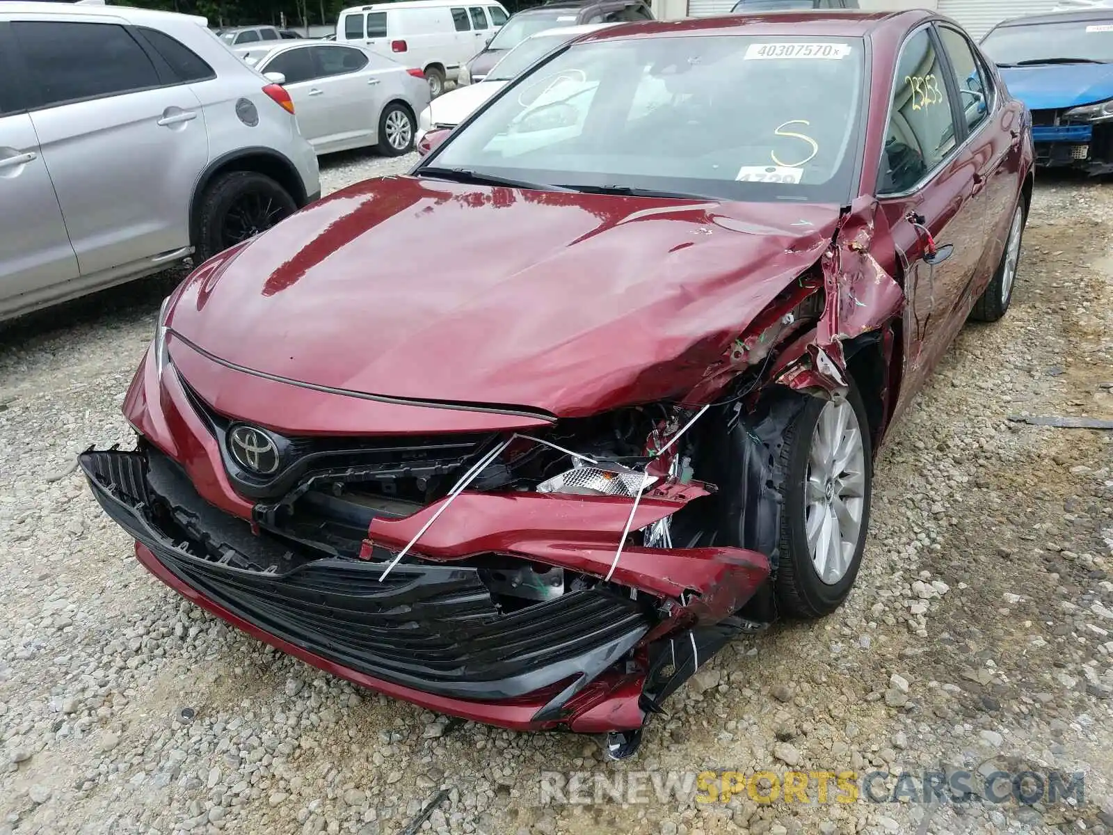 9 Photograph of a damaged car 4T1B11HK0KU701095 TOYOTA CAMRY 2019