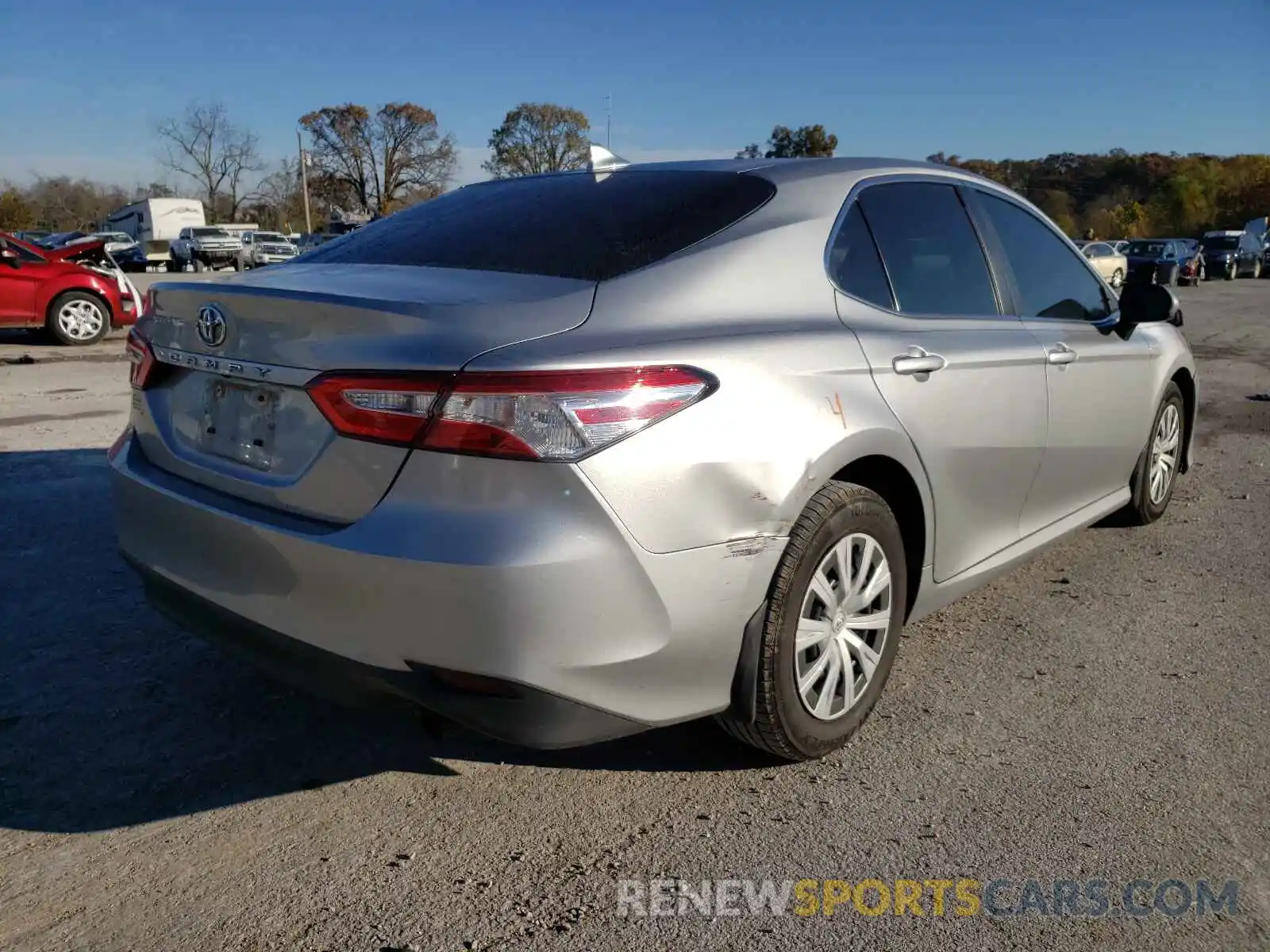 4 Photograph of a damaged car 4T1B11HK0KU701257 TOYOTA CAMRY 2019