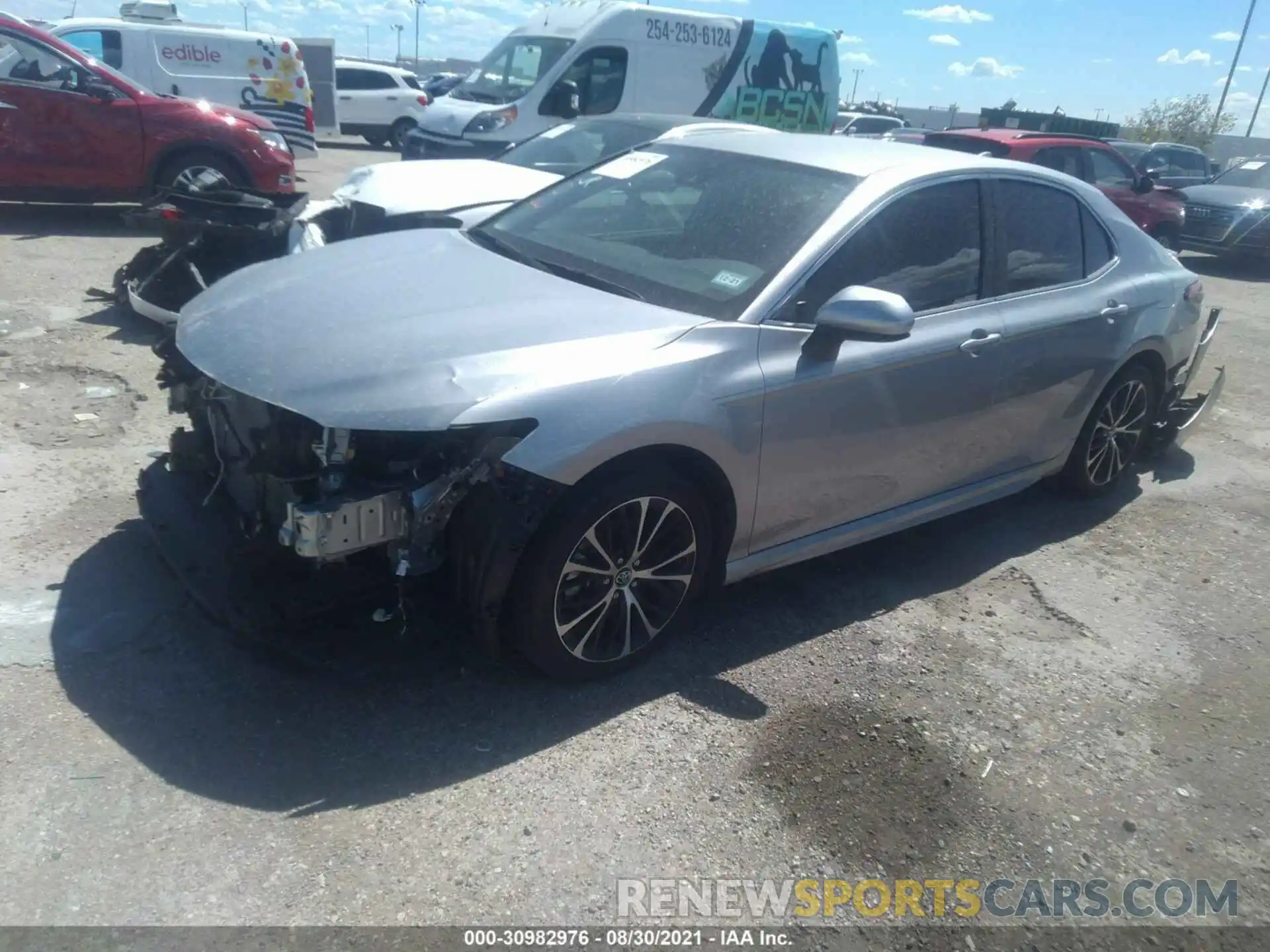 2 Photograph of a damaged car 4T1B11HK0KU702280 TOYOTA CAMRY 2019