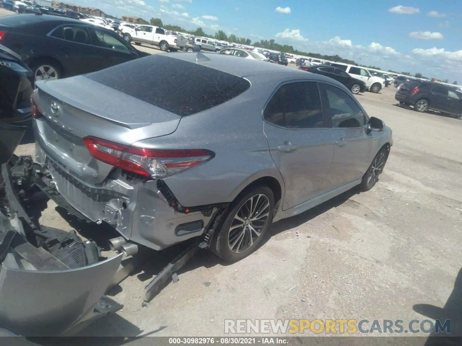 4 Photograph of a damaged car 4T1B11HK0KU702280 TOYOTA CAMRY 2019