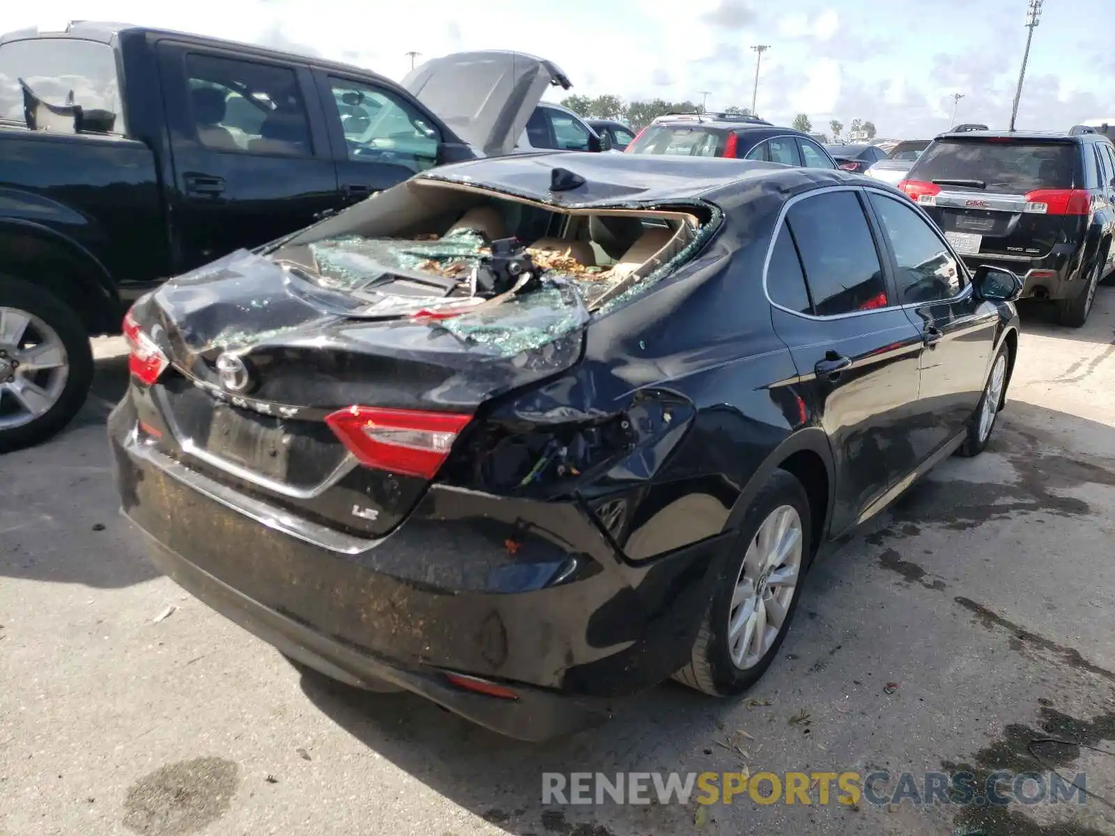 4 Photograph of a damaged car 4T1B11HK0KU702621 TOYOTA CAMRY 2019