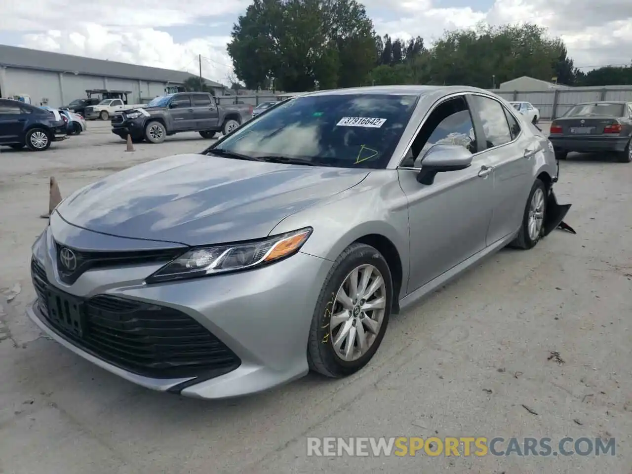 2 Photograph of a damaged car 4T1B11HK0KU705647 TOYOTA CAMRY 2019