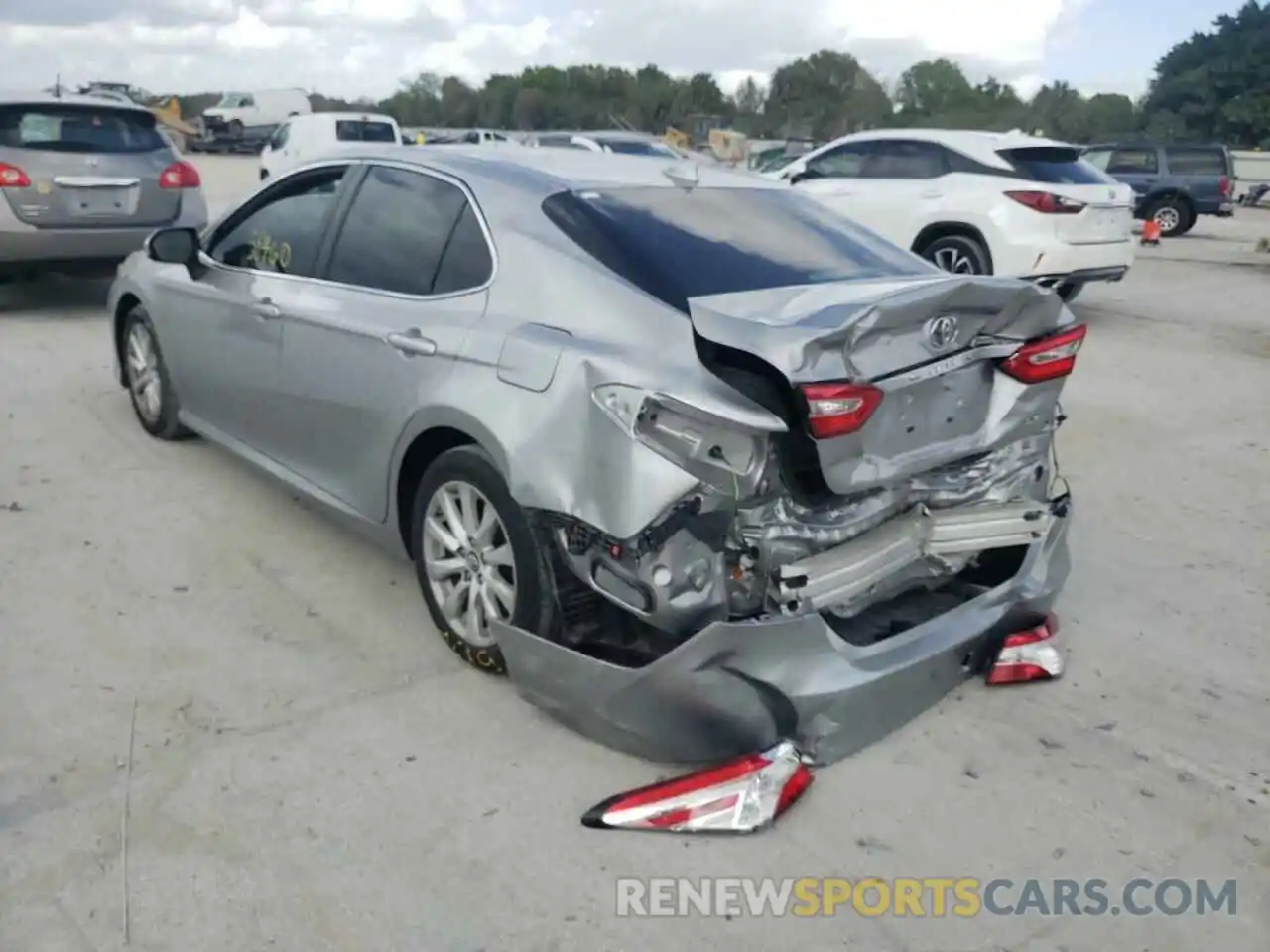 3 Photograph of a damaged car 4T1B11HK0KU705647 TOYOTA CAMRY 2019