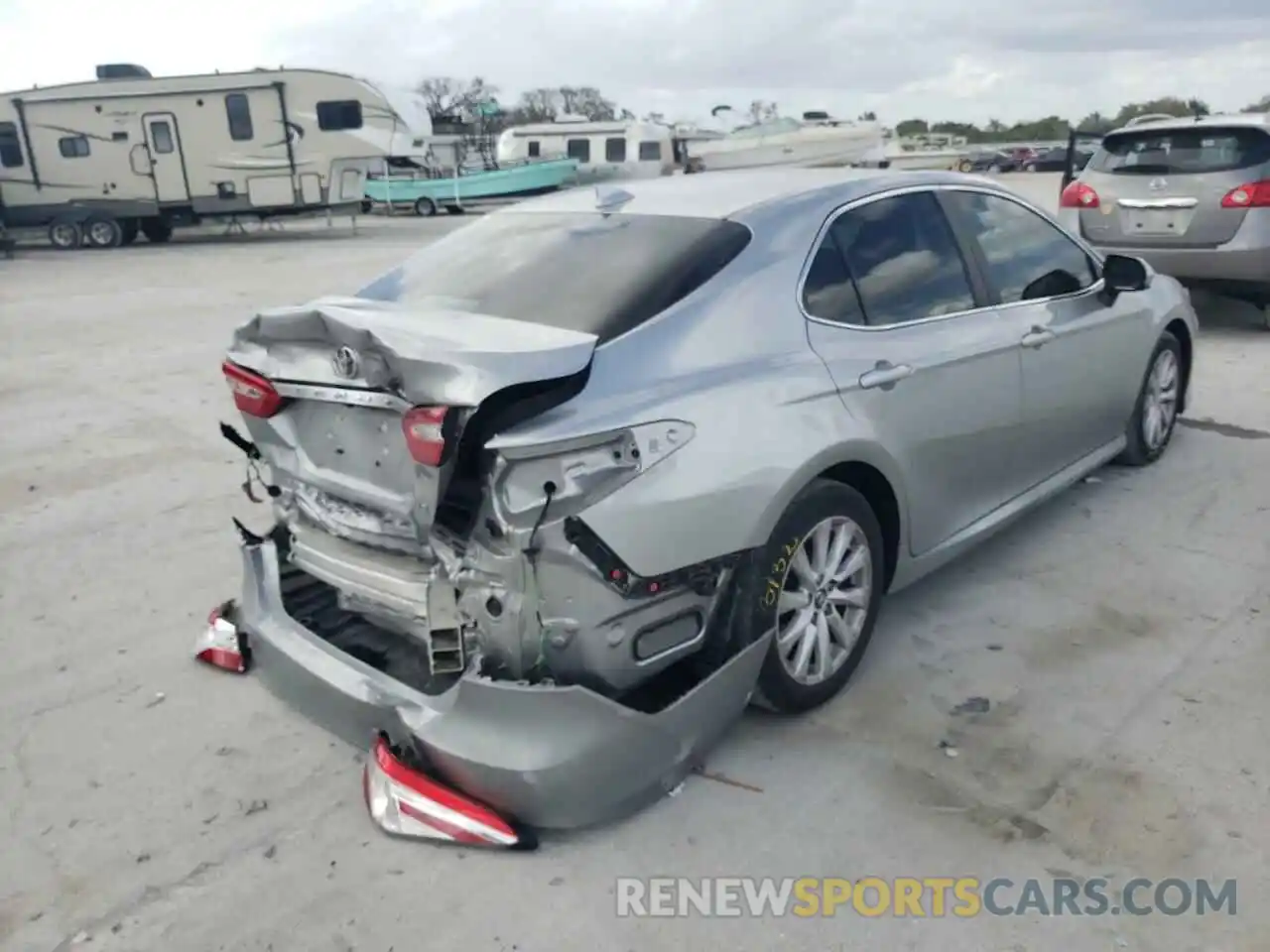 4 Photograph of a damaged car 4T1B11HK0KU705647 TOYOTA CAMRY 2019