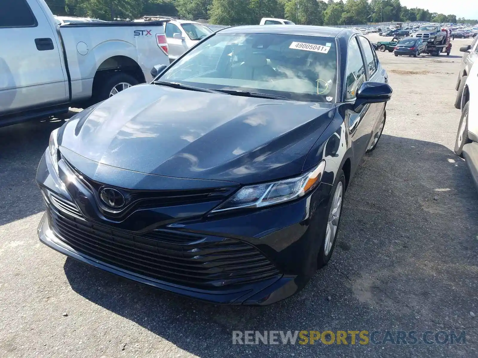 2 Photograph of a damaged car 4T1B11HK0KU705874 TOYOTA CAMRY 2019