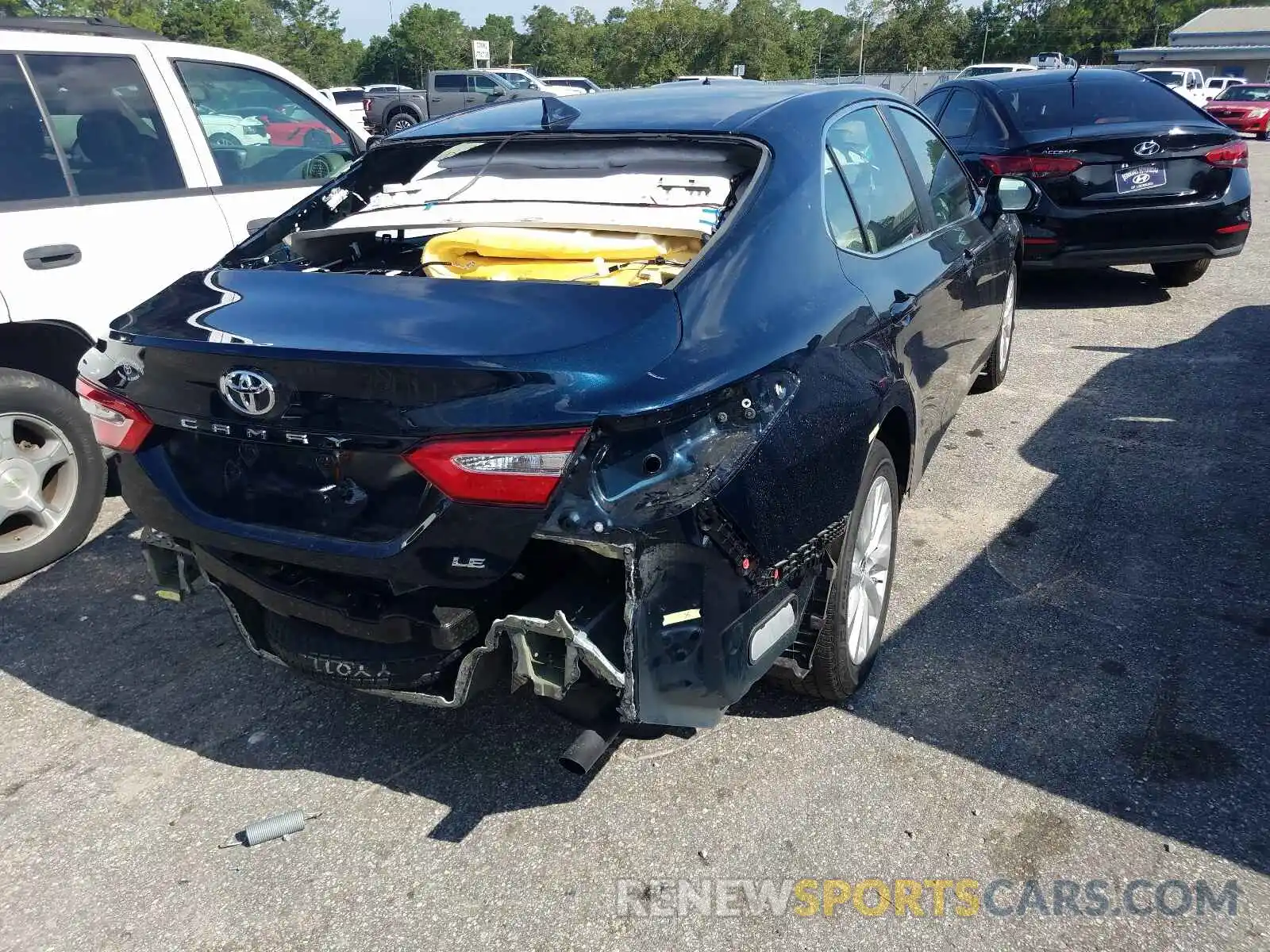 4 Photograph of a damaged car 4T1B11HK0KU705874 TOYOTA CAMRY 2019