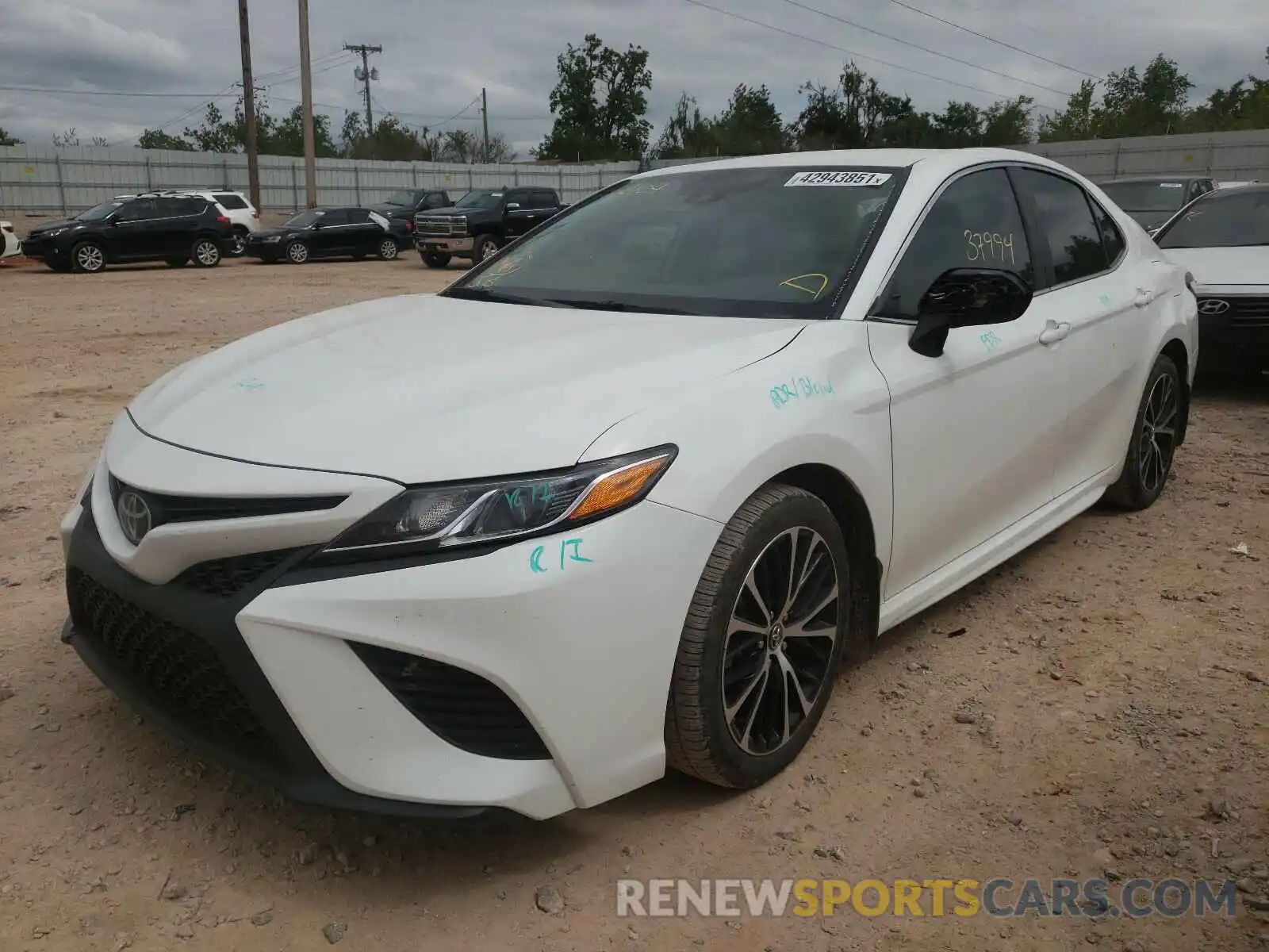 2 Photograph of a damaged car 4T1B11HK0KU706104 TOYOTA CAMRY 2019