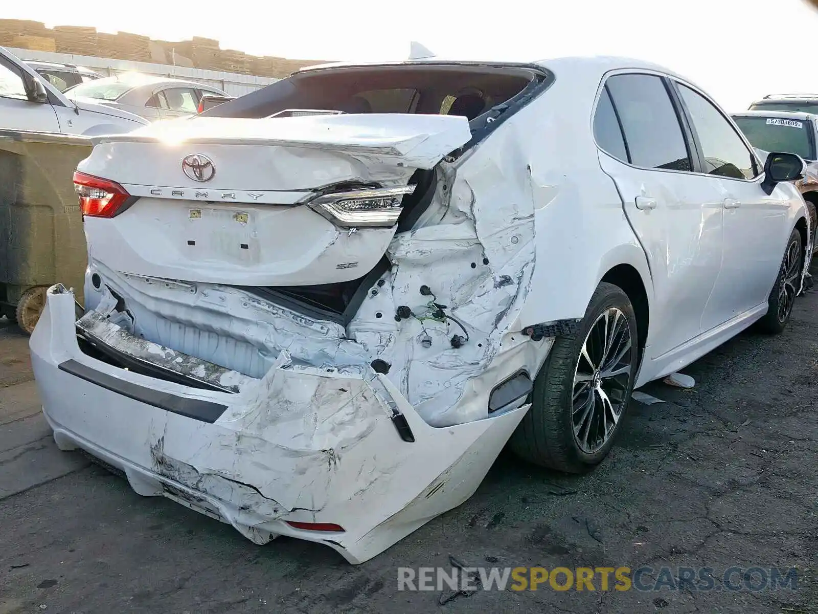 4 Photograph of a damaged car 4T1B11HK0KU706927 TOYOTA CAMRY 2019