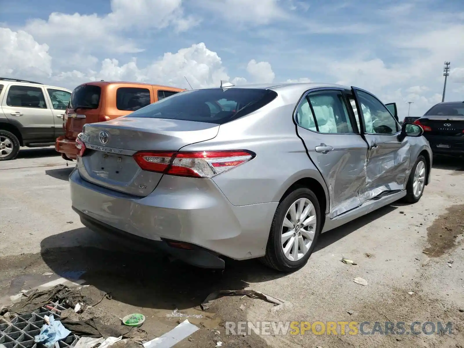 4 Photograph of a damaged car 4T1B11HK0KU708158 TOYOTA CAMRY 2019