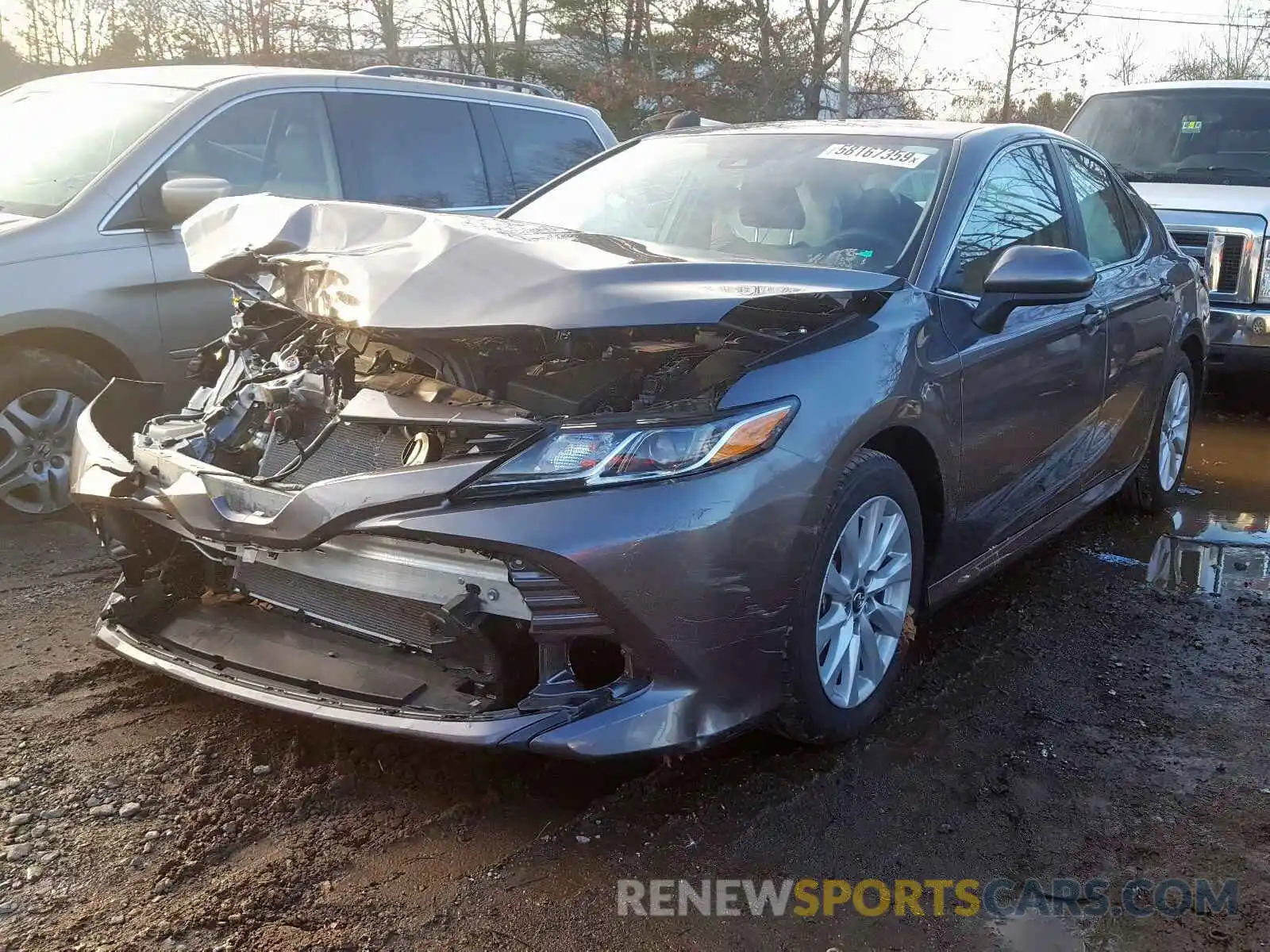 2 Photograph of a damaged car 4T1B11HK0KU708869 TOYOTA CAMRY 2019