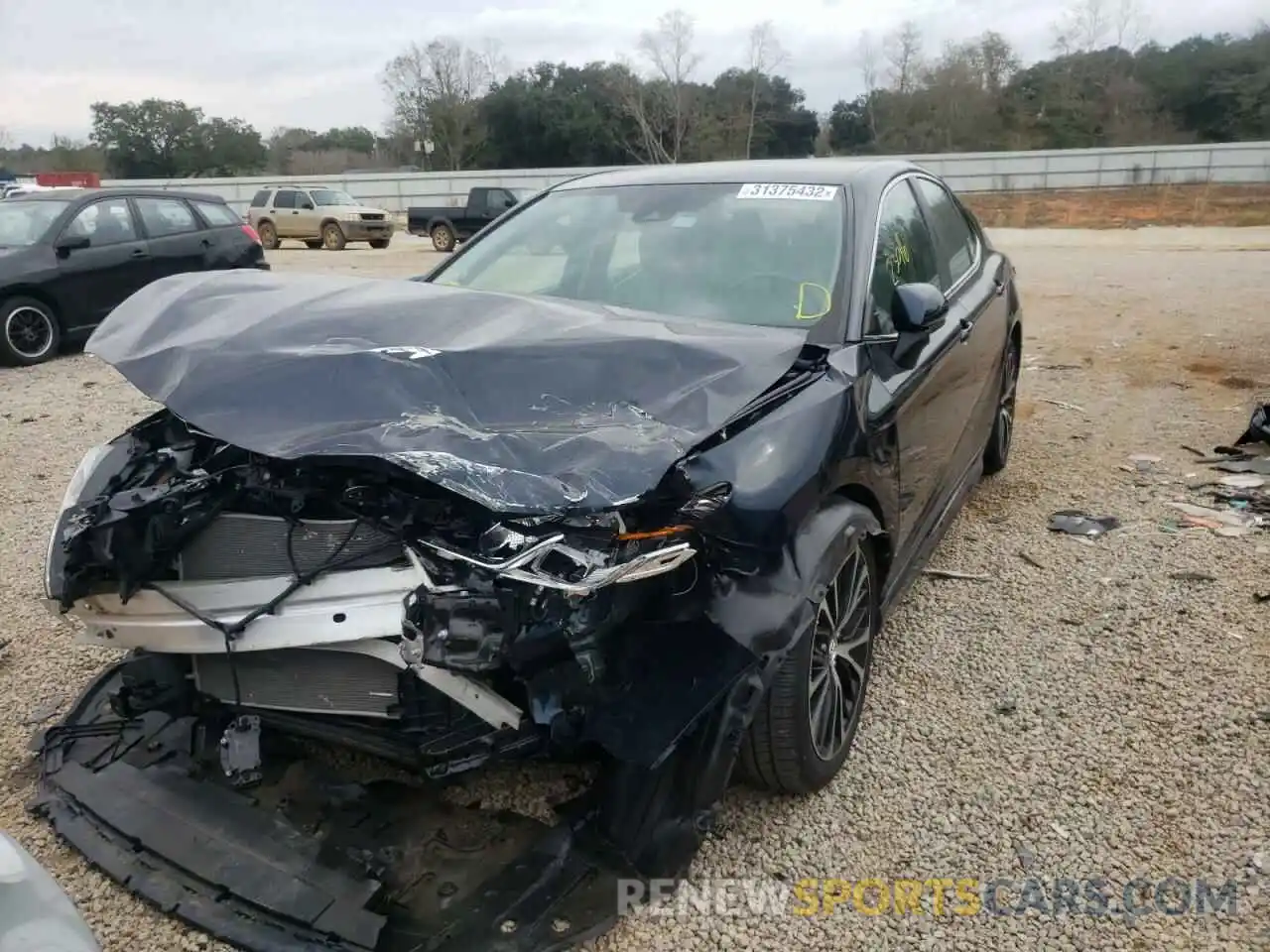 2 Photograph of a damaged car 4T1B11HK0KU709889 TOYOTA CAMRY 2019