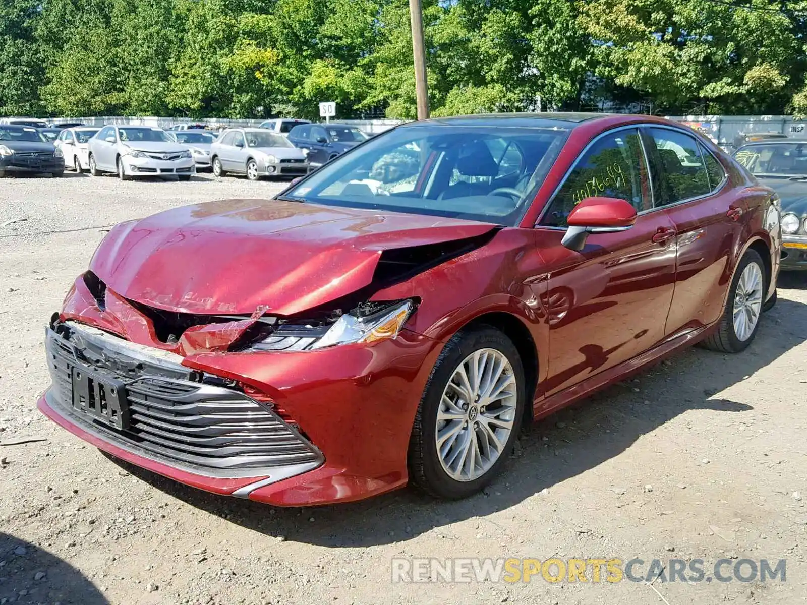 2 Photograph of a damaged car 4T1B11HK0KU710377 TOYOTA CAMRY 2019