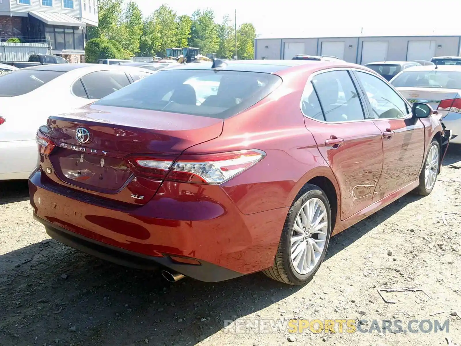 4 Photograph of a damaged car 4T1B11HK0KU710377 TOYOTA CAMRY 2019