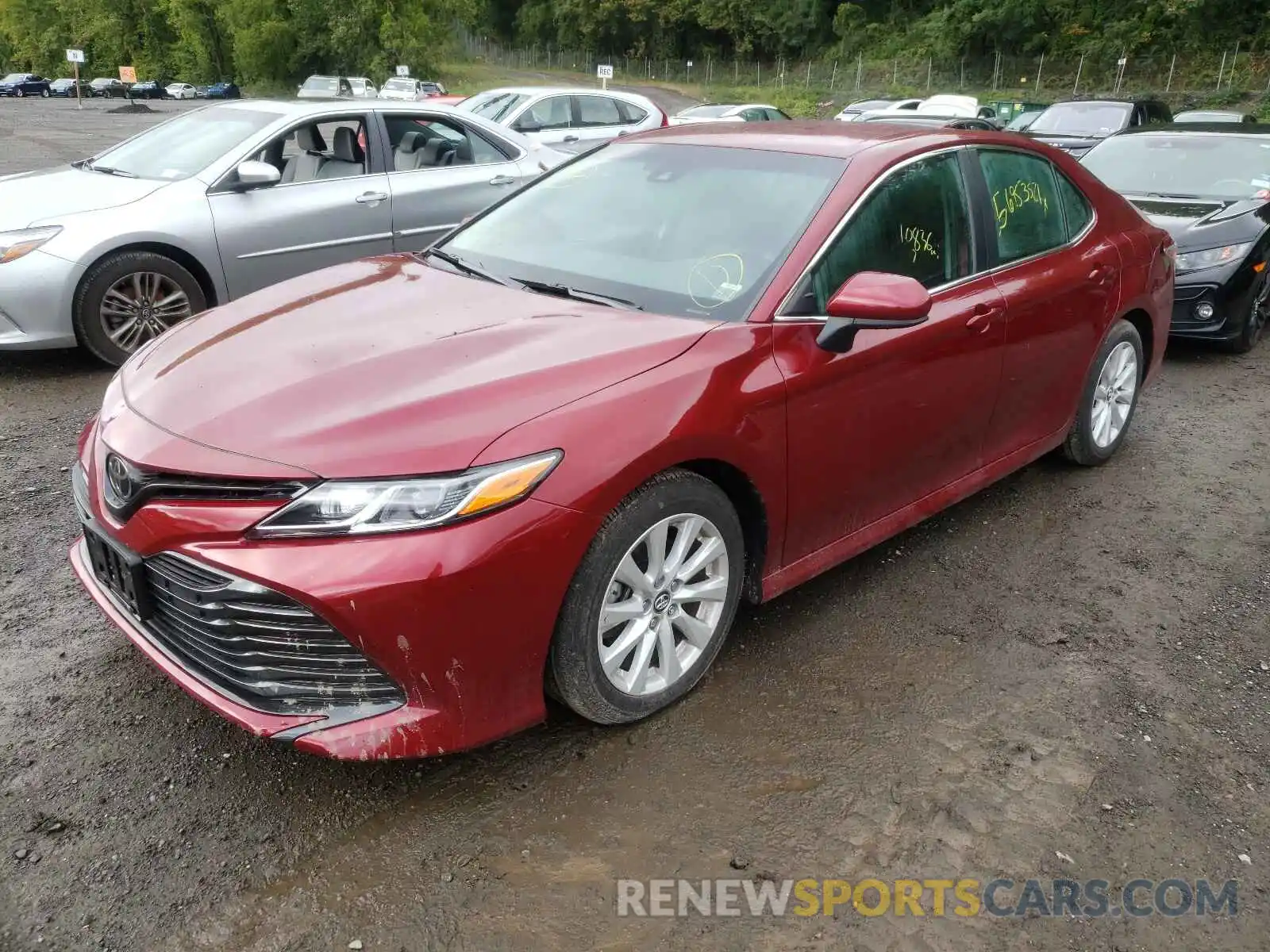 2 Photograph of a damaged car 4T1B11HK0KU711125 TOYOTA CAMRY 2019