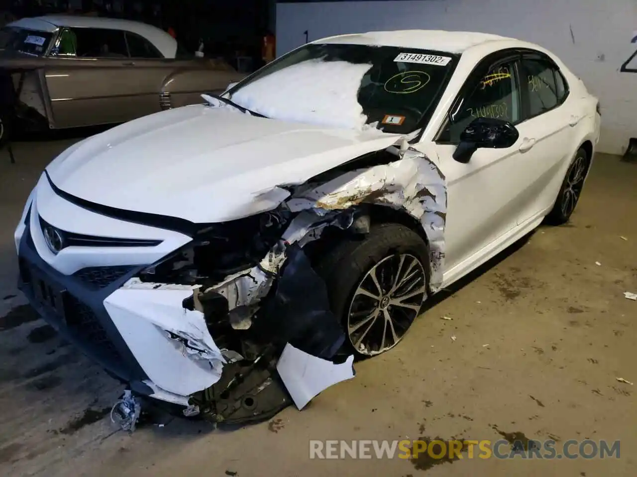 2 Photograph of a damaged car 4T1B11HK0KU711819 TOYOTA CAMRY 2019