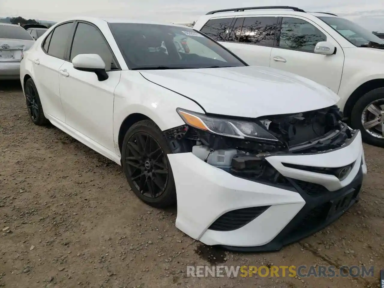 1 Photograph of a damaged car 4T1B11HK0KU715112 TOYOTA CAMRY 2019