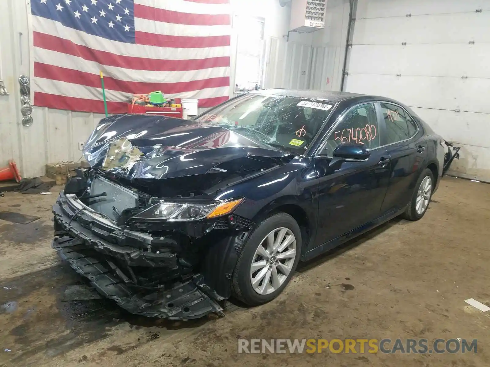 2 Photograph of a damaged car 4T1B11HK0KU715157 TOYOTA CAMRY 2019