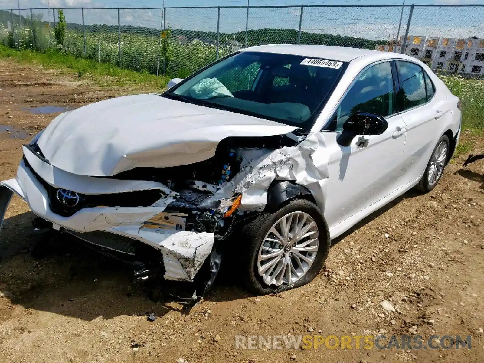 2 Photograph of a damaged car 4T1B11HK0KU715689 TOYOTA CAMRY 2019