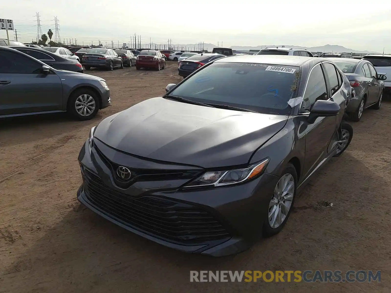 2 Photograph of a damaged car 4T1B11HK0KU715742 TOYOTA CAMRY 2019