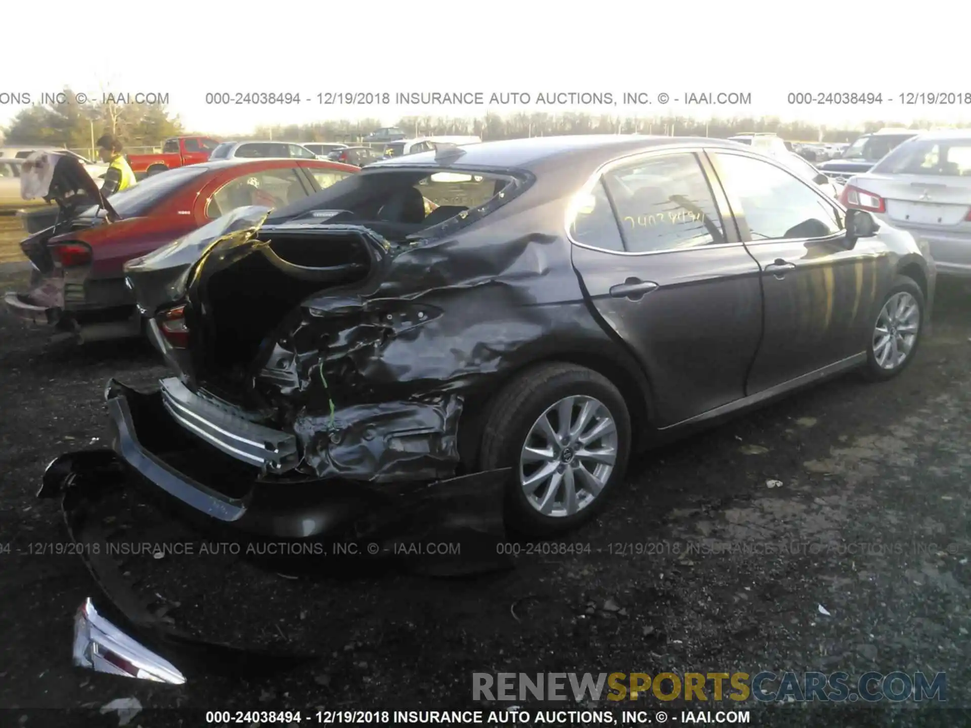 4 Photograph of a damaged car 4T1B11HK0KU715997 TOYOTA CAMRY 2019